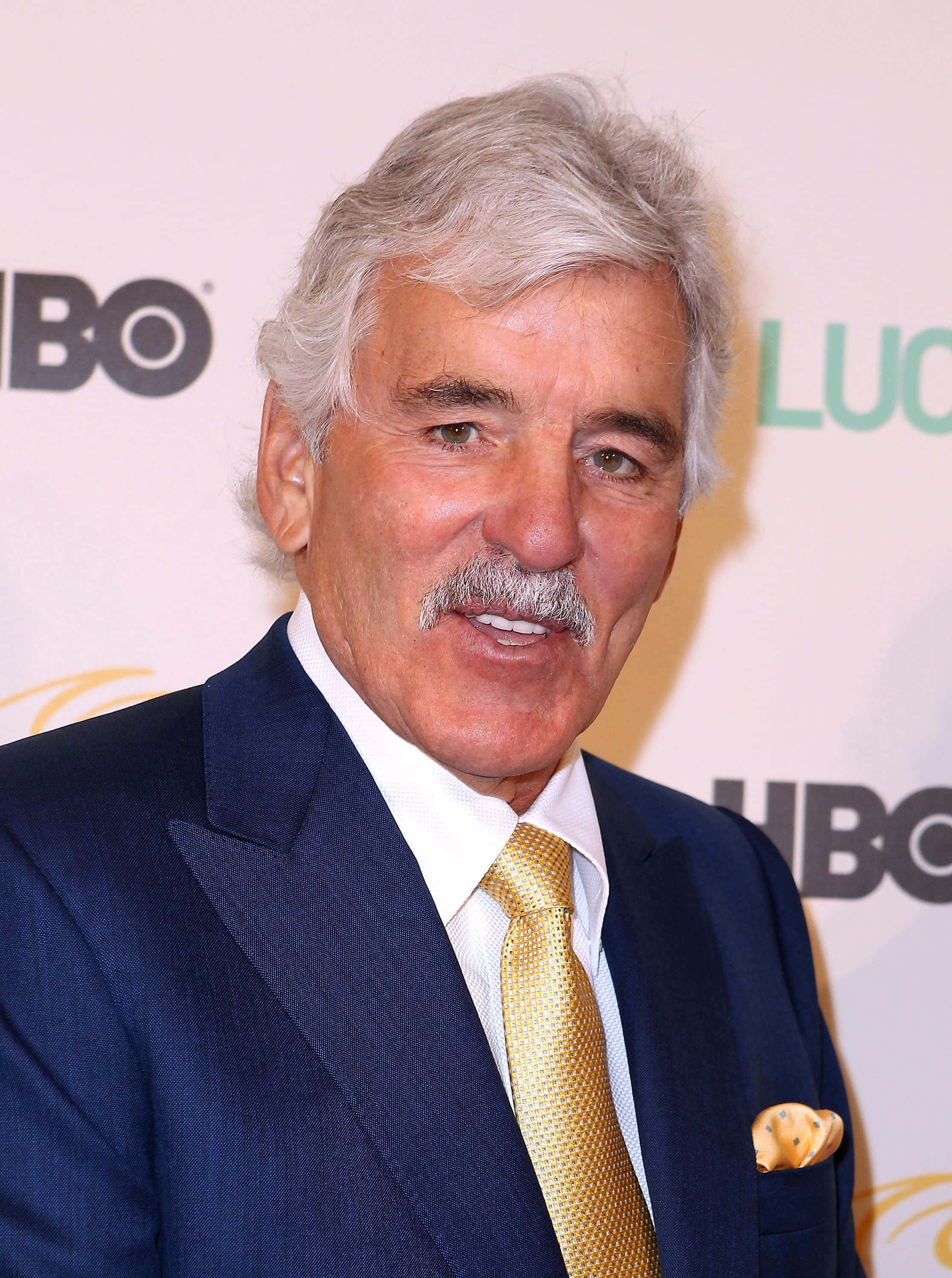 Dennis Farina, navy suit, gold tie, 2K Phone Wallpaper