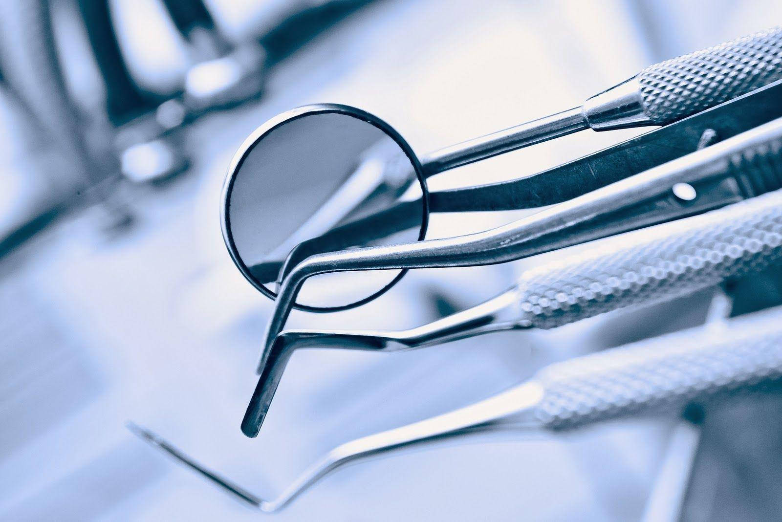 dental tools, textured grips, cool blue clinical surface, HD Desktop Wallpaper