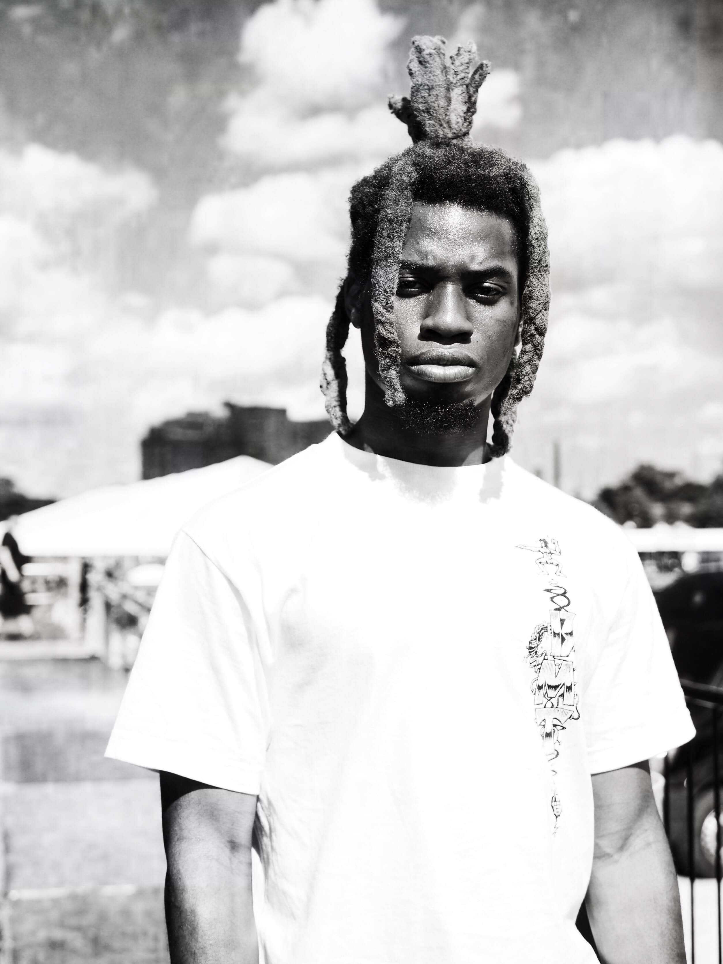 Denzel Curry, black and white portrait, mohawk hairstyle, 2K Phone Wallpaper