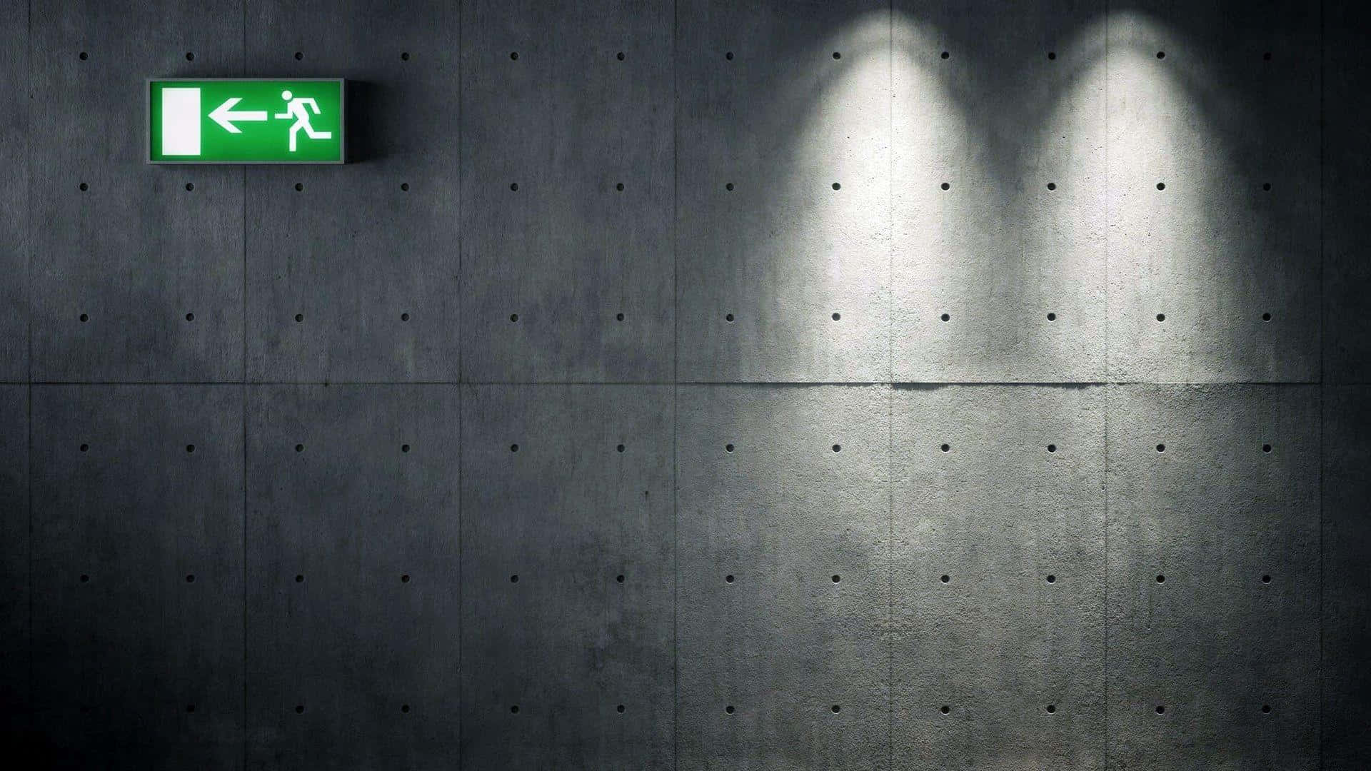 green emergency exit sign, dark concrete wall, three spotlights, Full HD Desktop Wallpaper