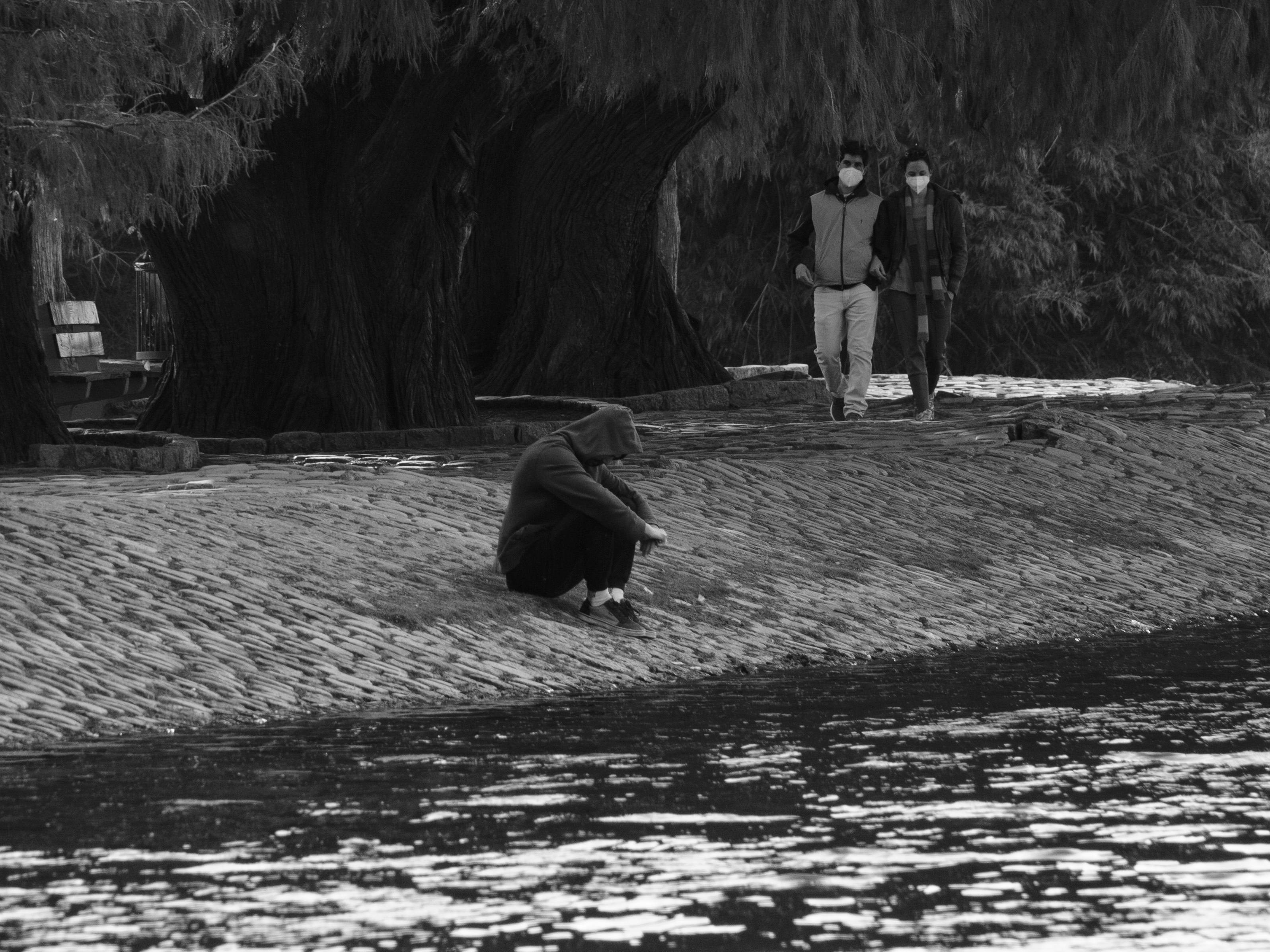No Friends Depressing, hooded figure, rippling waterway, 2K Desktop Wallpaper