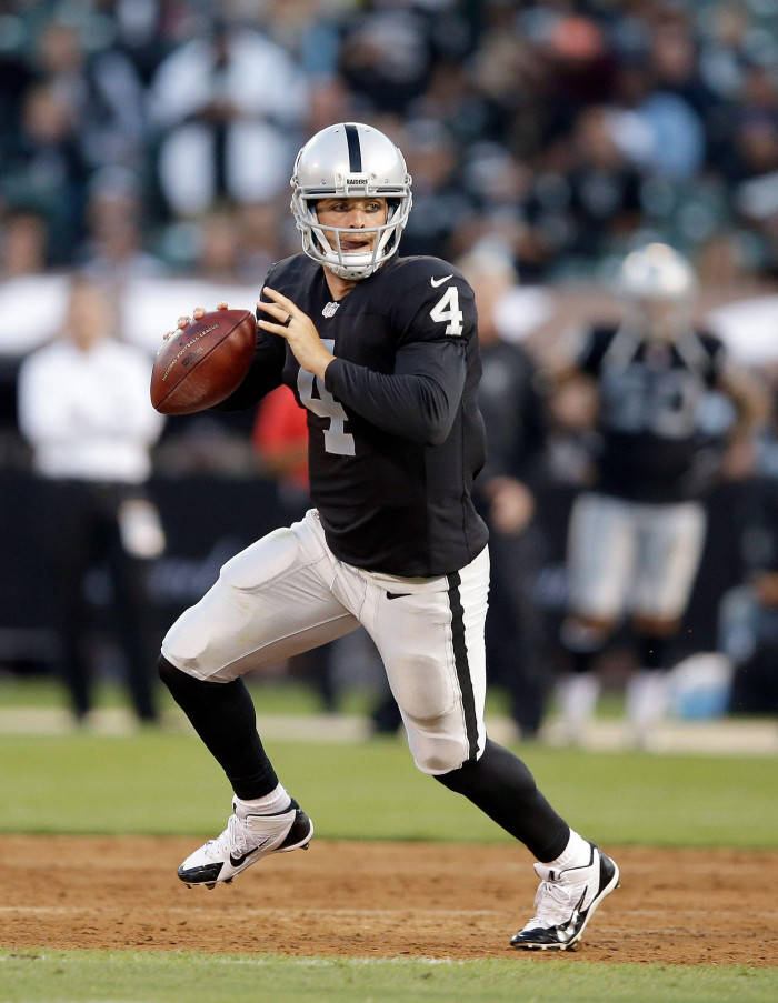 Derek Carr, black and silver uniform, stadium lights, SD Phone Wallpaper