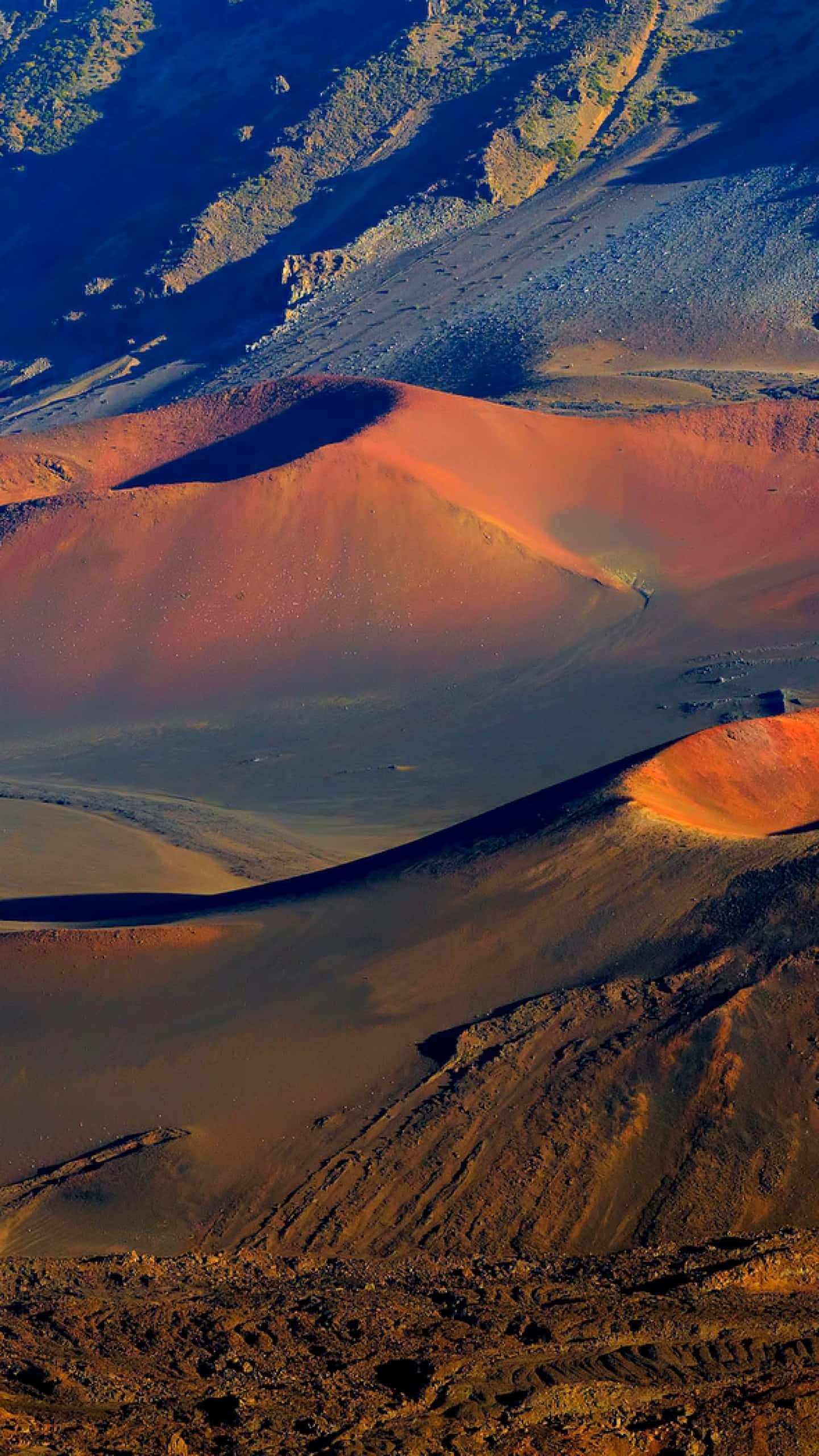 Desert iPhone, orange glow, rugged volcanic terrain, 2K Phone Wallpaper