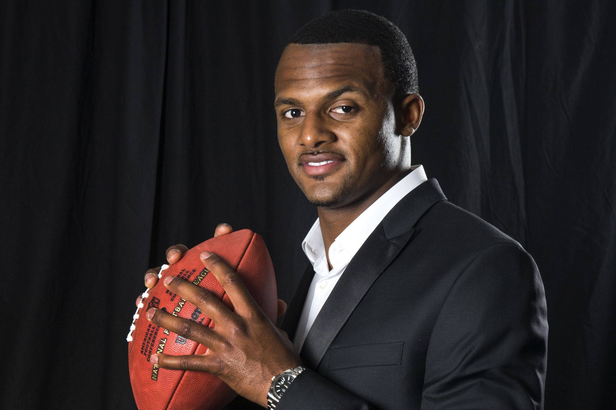 Deshaun Watson, black suit, red football, Full HD Desktop Wallpaper