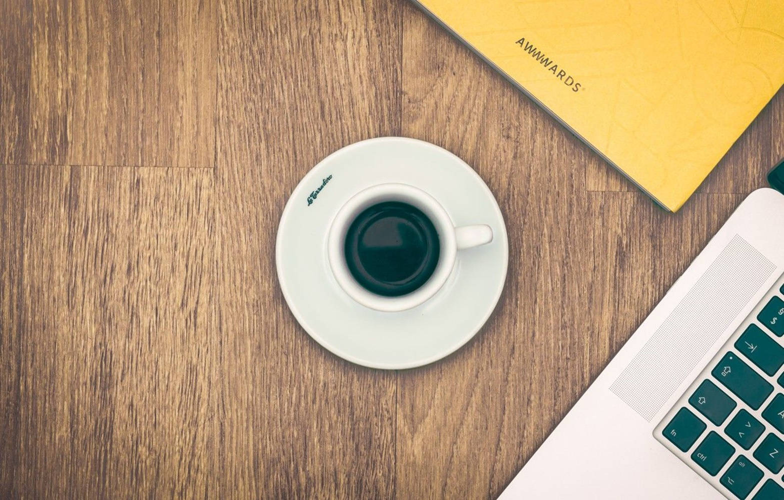 wooden laminated office desk, white coffee cup, laptop, HD Desktop Wallpaper
