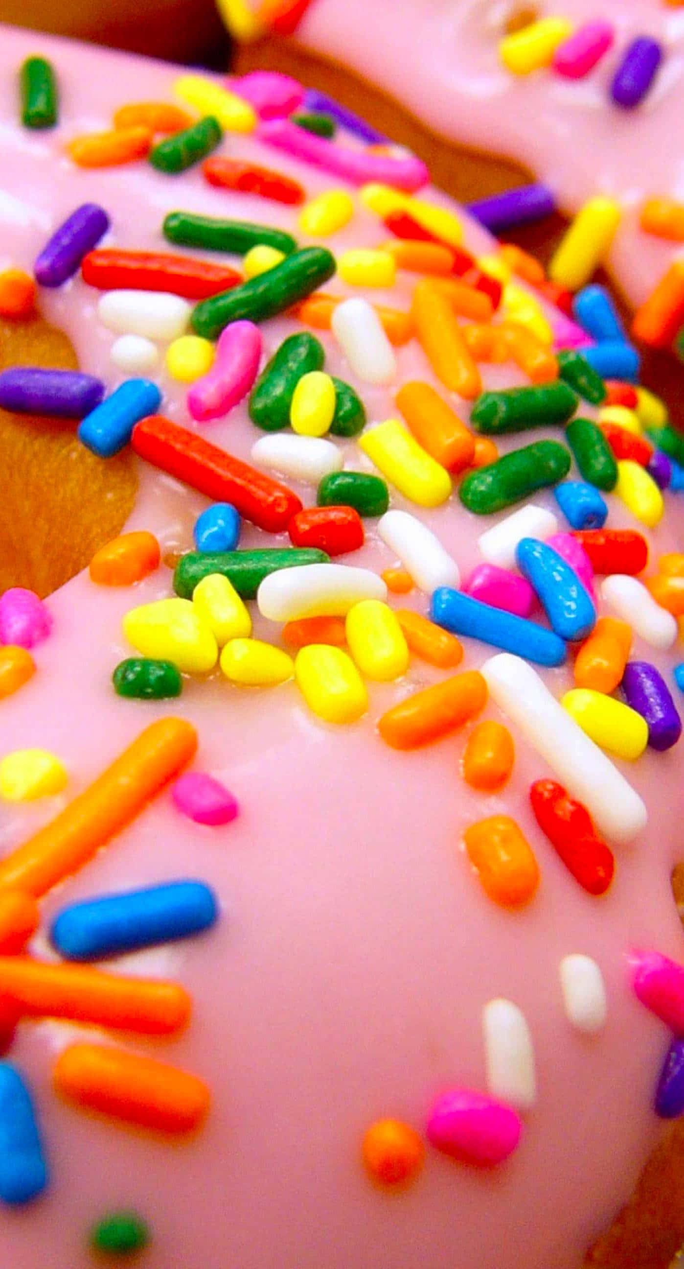 Dessert iPhone, colorful doughnut, glossy pink icing, 2K Phone Wallpaper