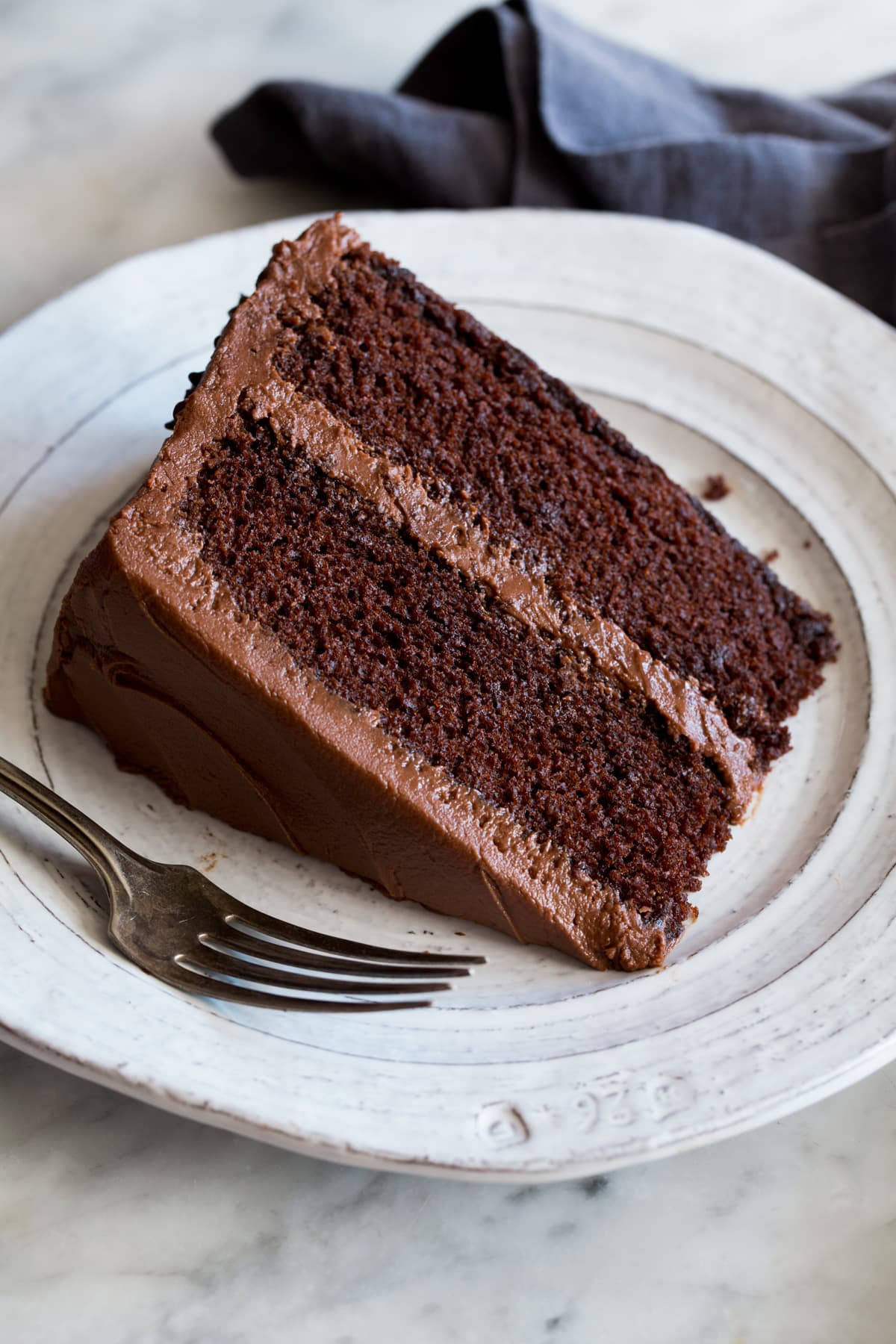 two layer chocolate cake, glossy frosting, rustic white plate, HD Phone Wallpaper