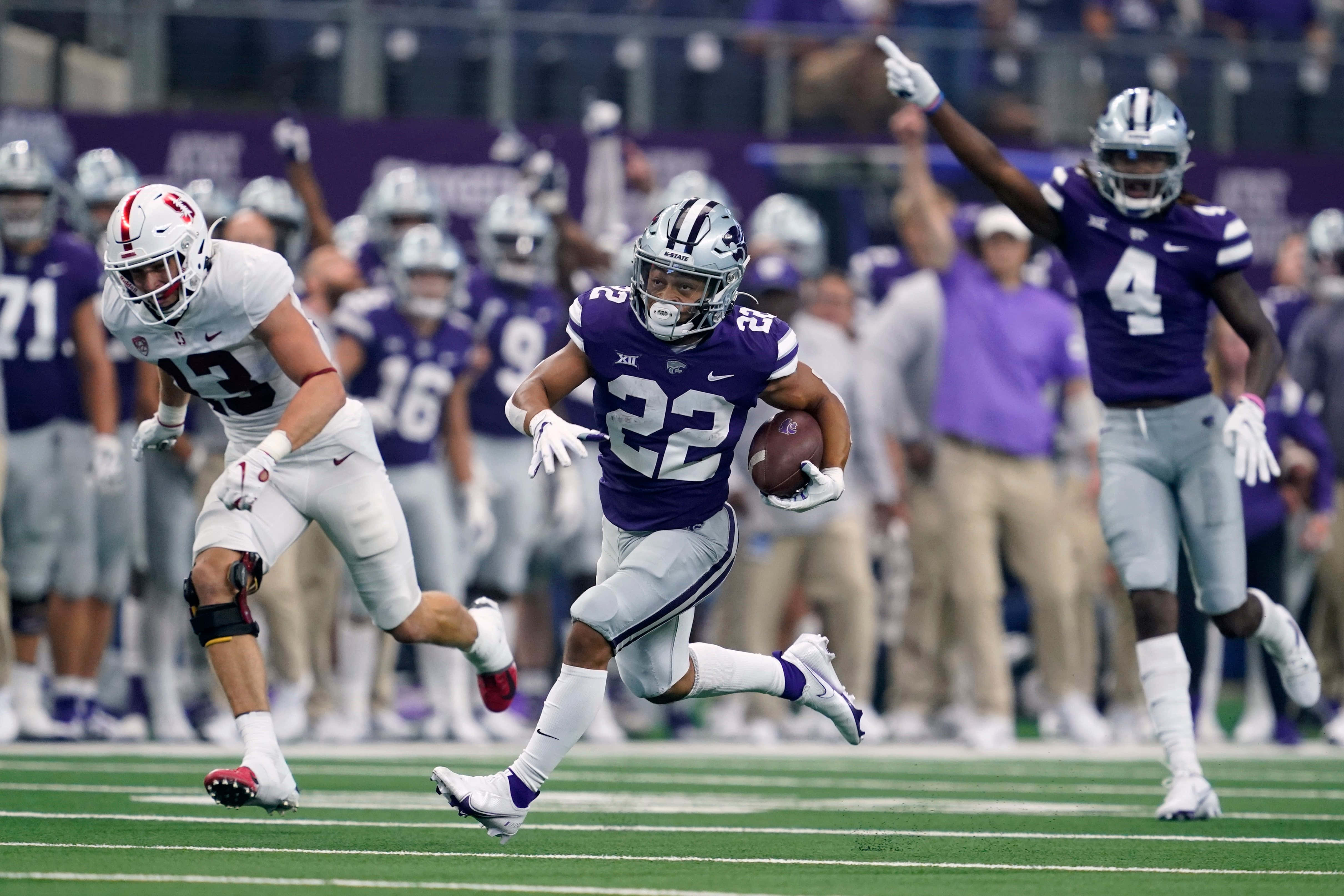 Deuce Vaughn, purple jersey, number 22, 4K Desktop Wallpaper