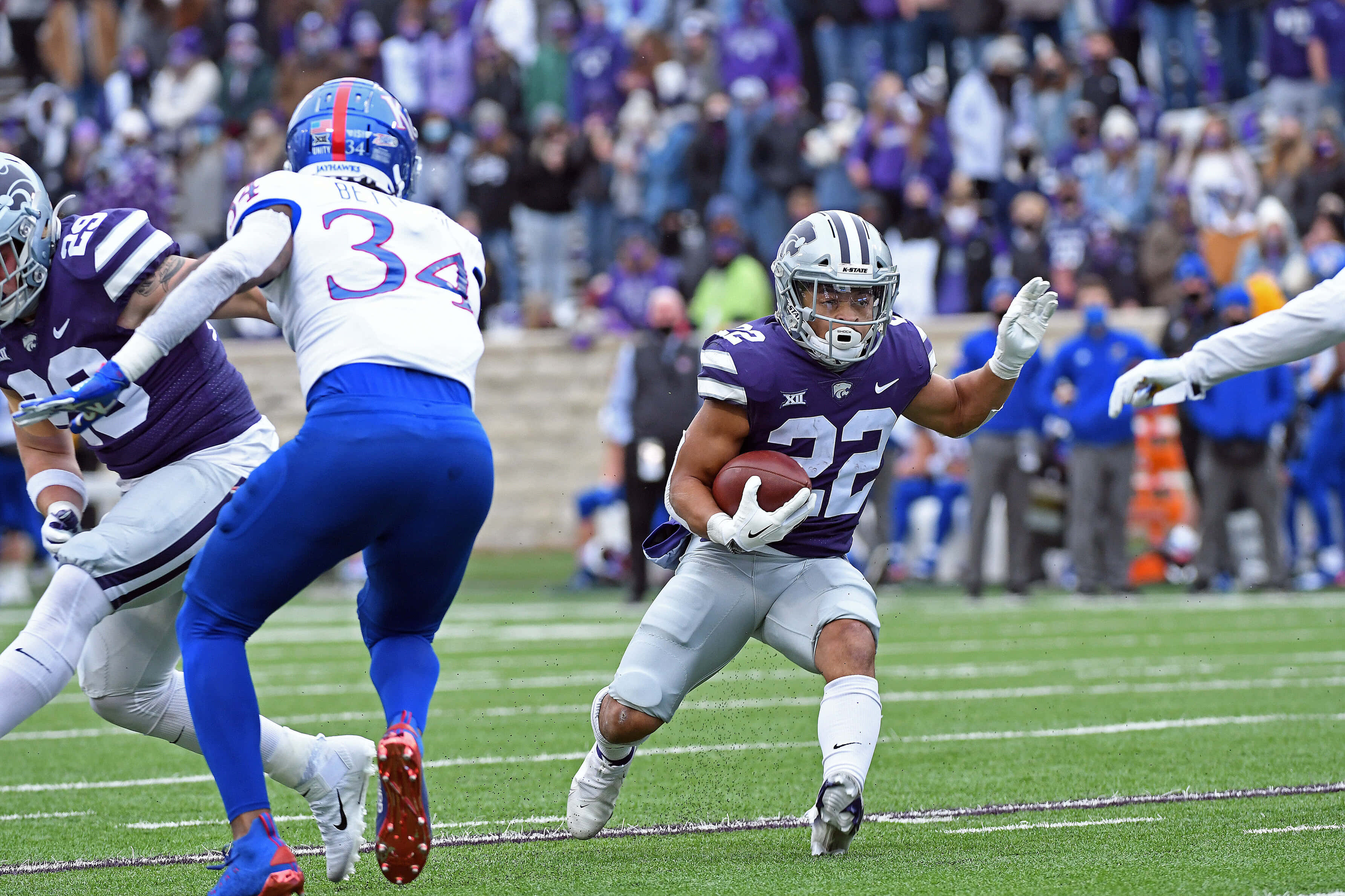 Deuce Vaughn, purple jersey, number 22, 2K Desktop Wallpaper