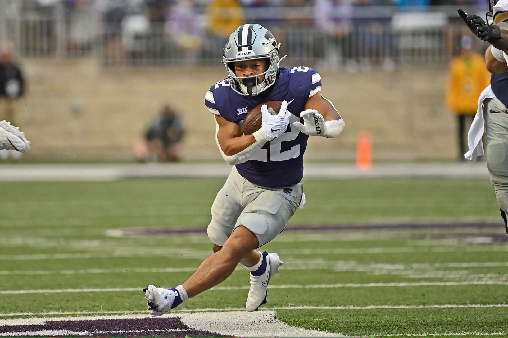 Deuce Vaughn, purple and silver uniform, green field, Full HD Desktop Wallpaper