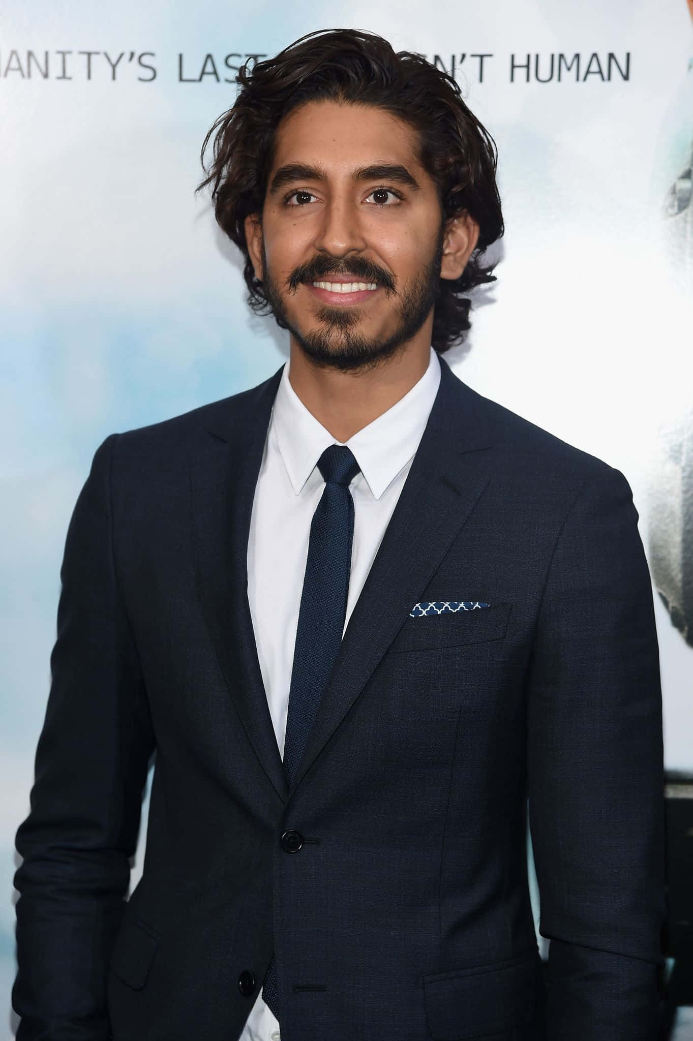 Dev Patel, navy suit, tie, Full HD Phone Wallpaper