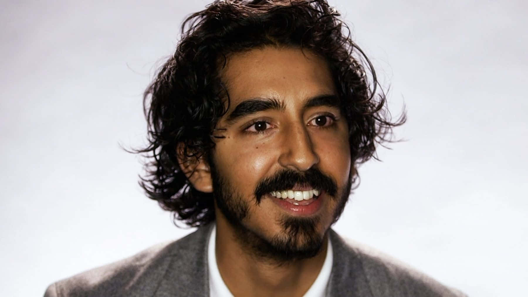 Dev Patel, dark curly hair, beard, HD Desktop Wallpaper