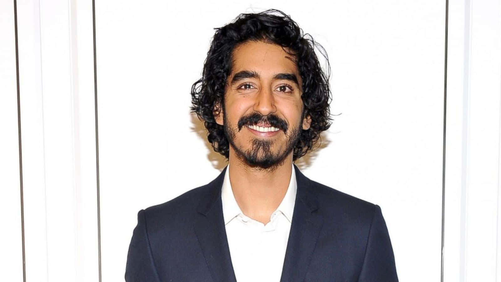 Dev Patel, stylish suit, curly dark hair, HD Desktop Wallpaper