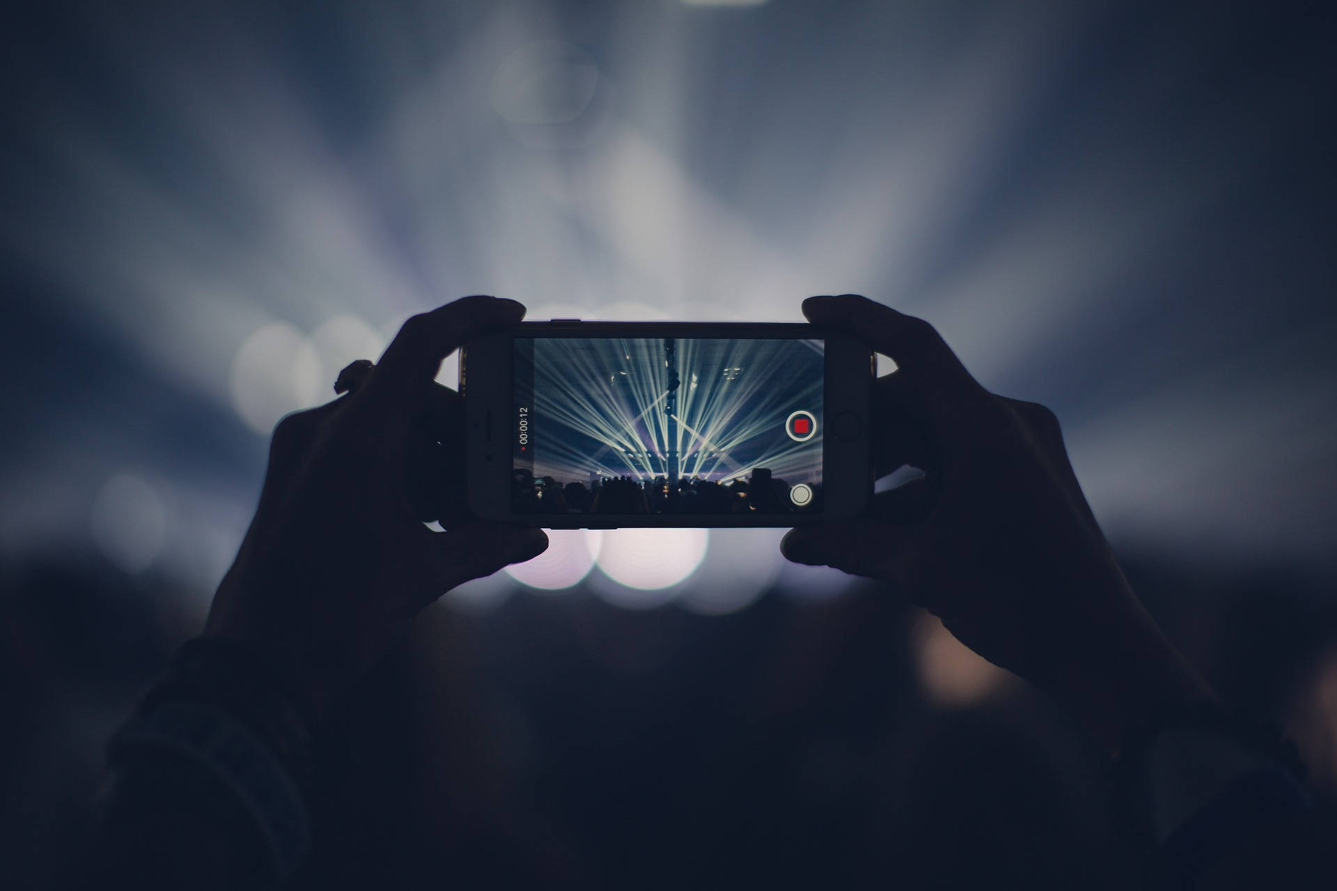 mobile phone, concert stage, radiant beams of light, Full HD Desktop Wallpaper