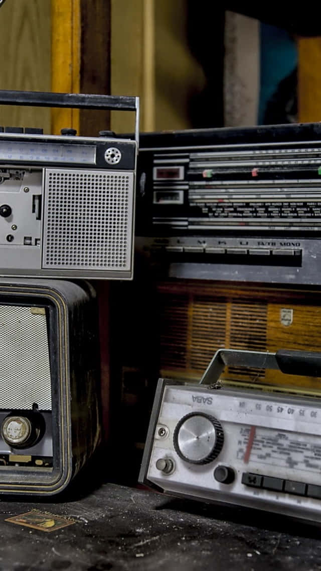 vintage radio receivers, vintage recorders, dusty cluttered pile, SD Phone Wallpaper