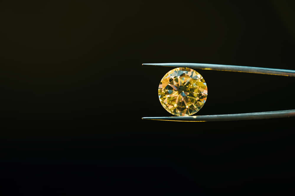 yellow diamond, tweezers, black background, SD Desktop Wallpaper