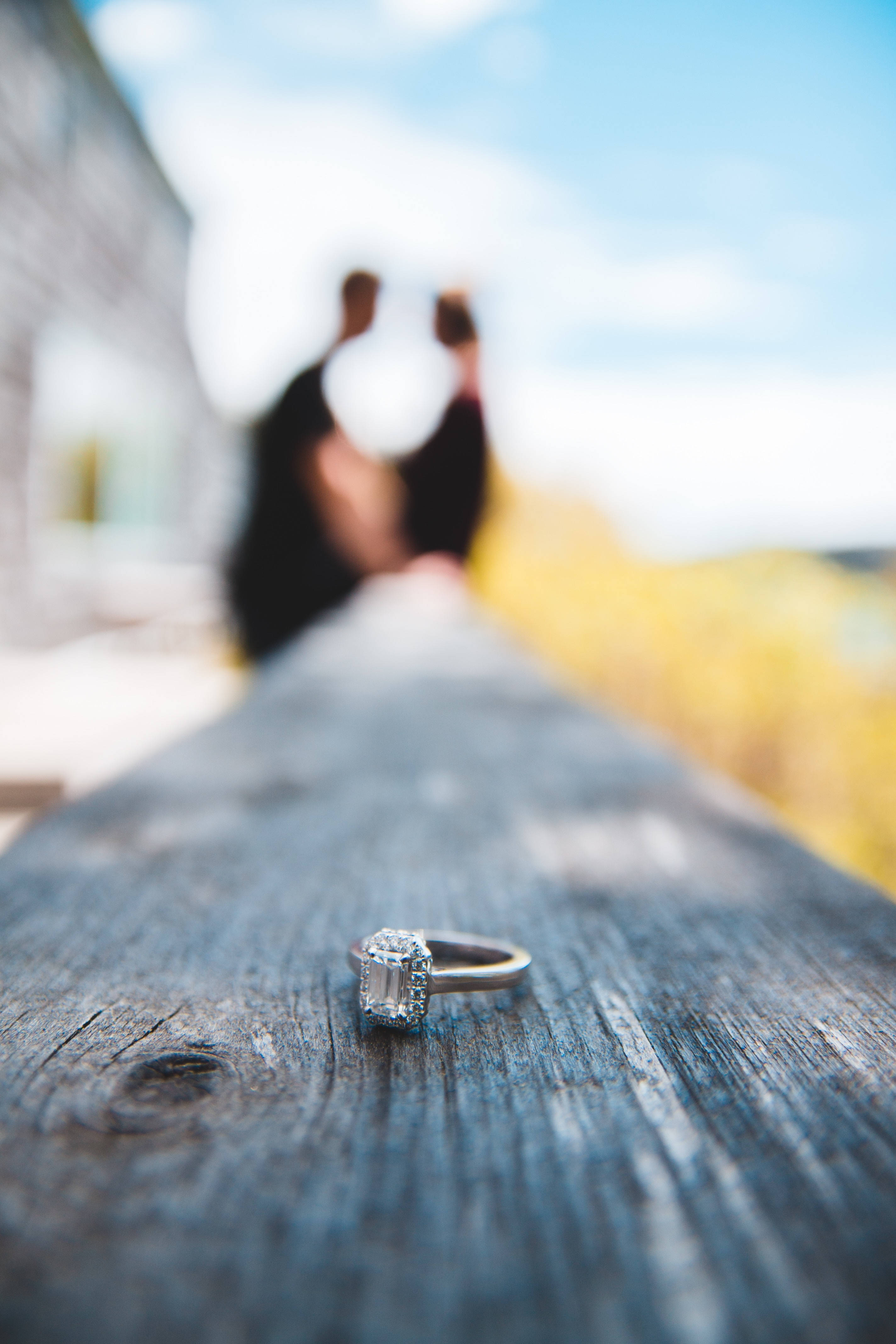 diamond ring, emerald-cut diamond, wooden surface, 4K Phone Wallpaper