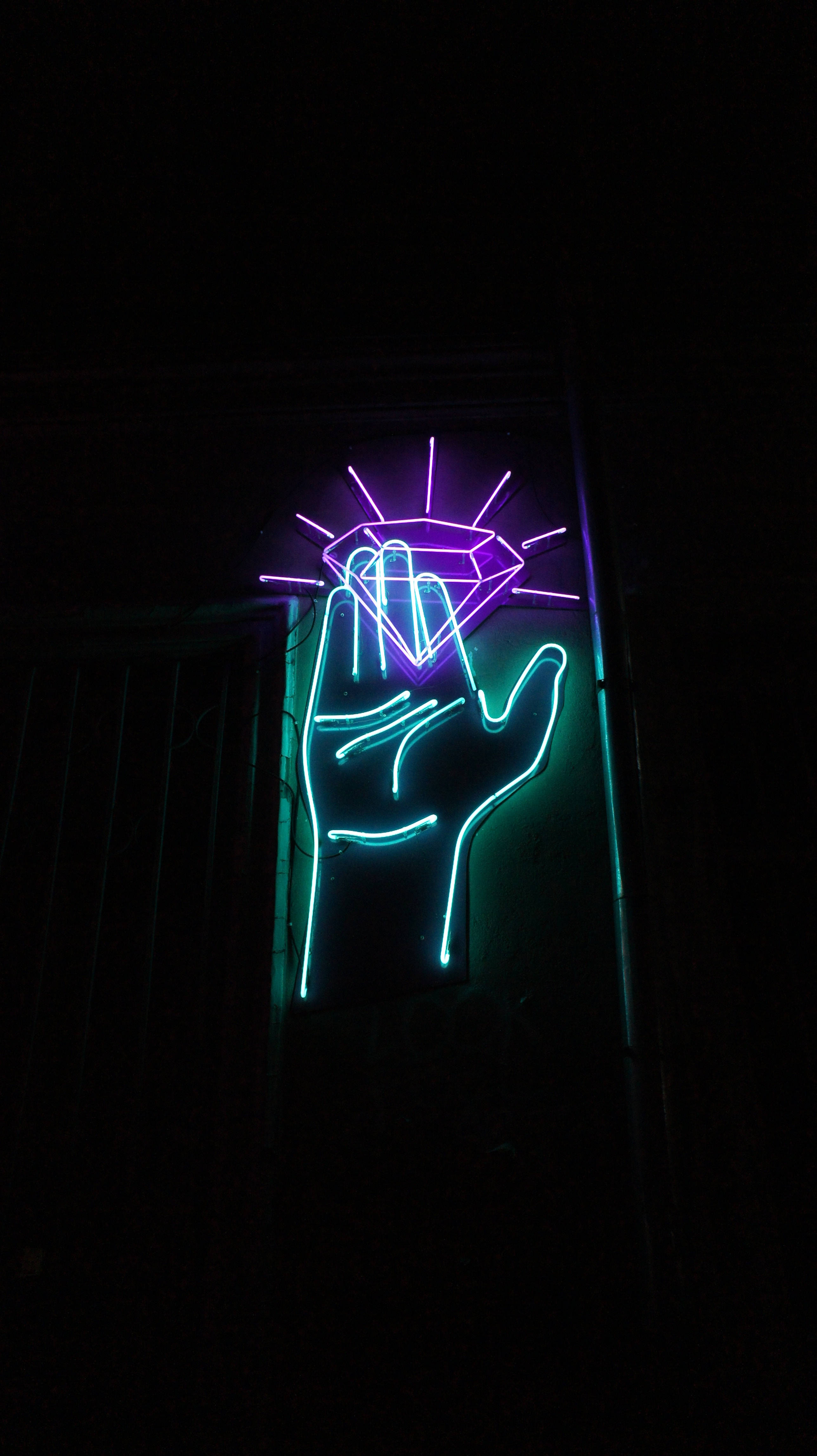 neon hand diamond signage, glowing neon sign, hand holding a radiant diamond, 4K Phone Wallpaper