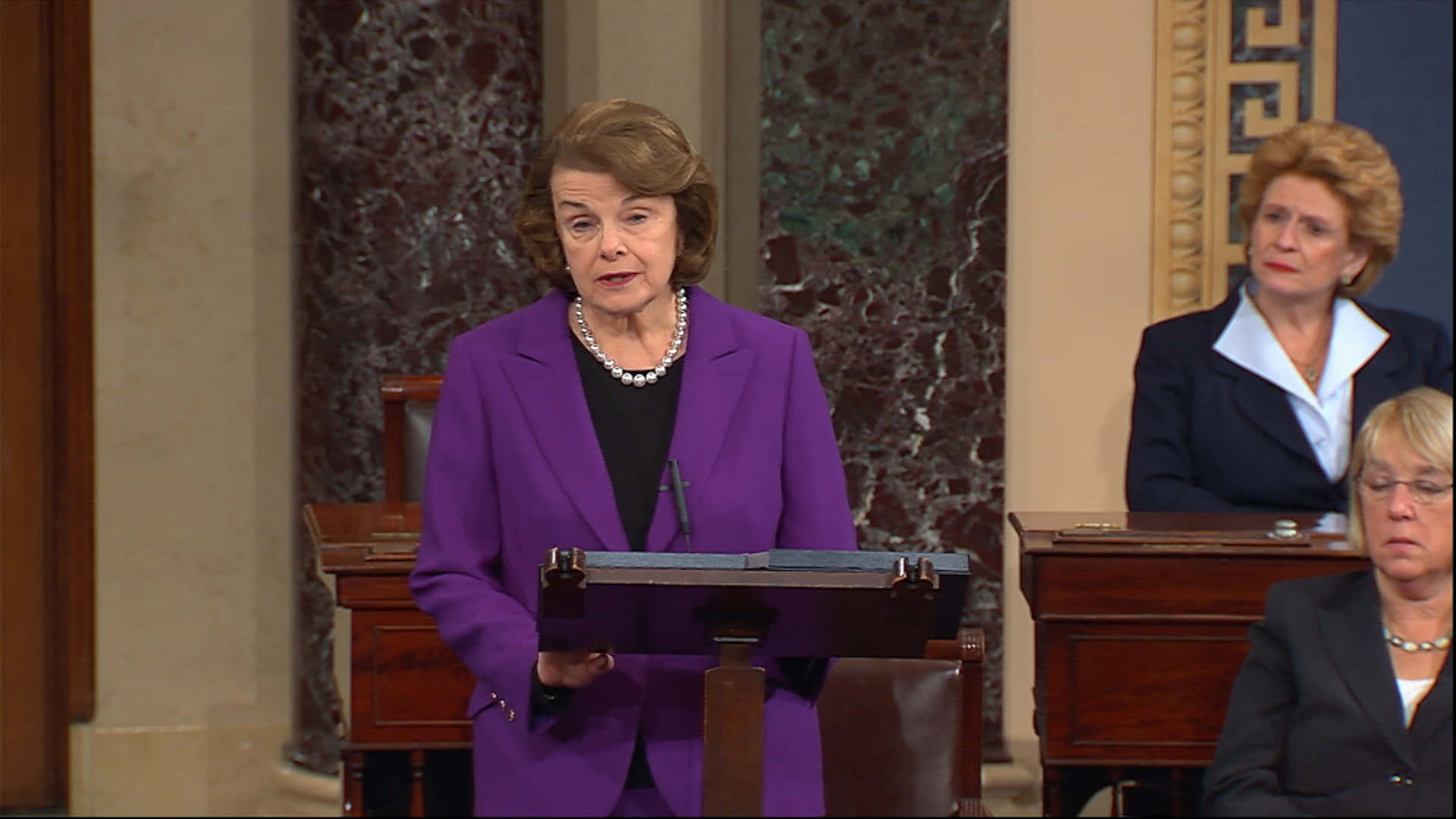 Dianne Feinstein, vibrant purple suit, wooden podium, Full HD Desktop Wallpaper