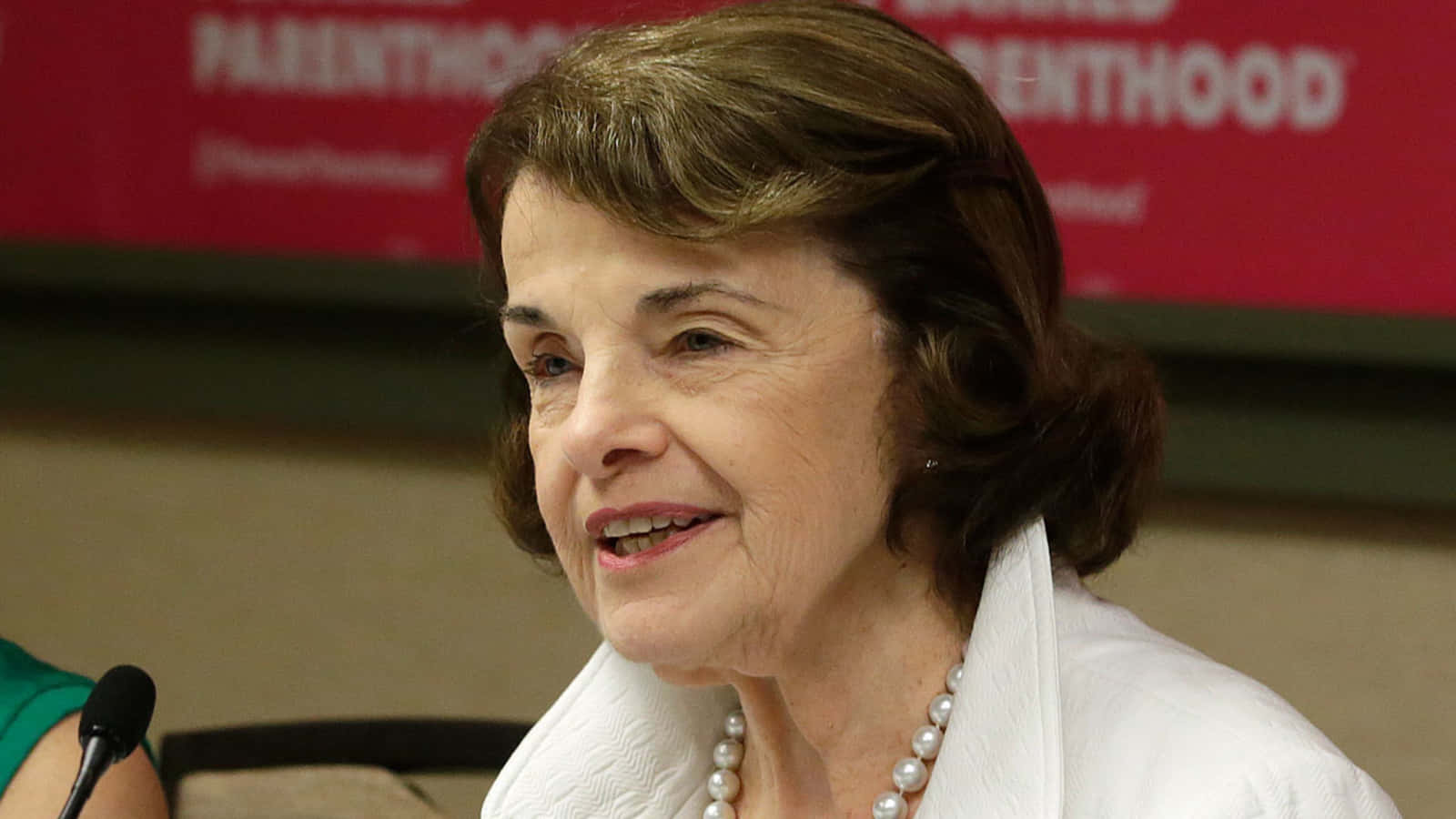 Dianne Feinstein, pearl necklace, red PARENTHOOD banner, HD Desktop Wallpaper