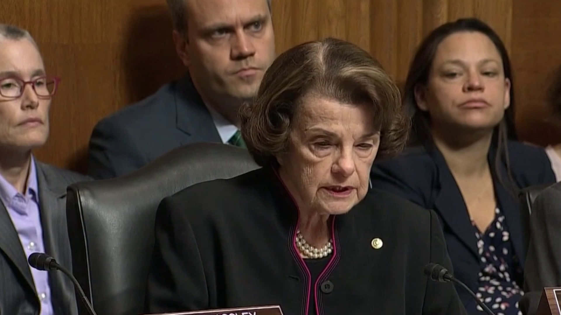 Dianne Feinstein, black blazer with pink trim, wood-paneled room, Full HD Desktop Wallpaper