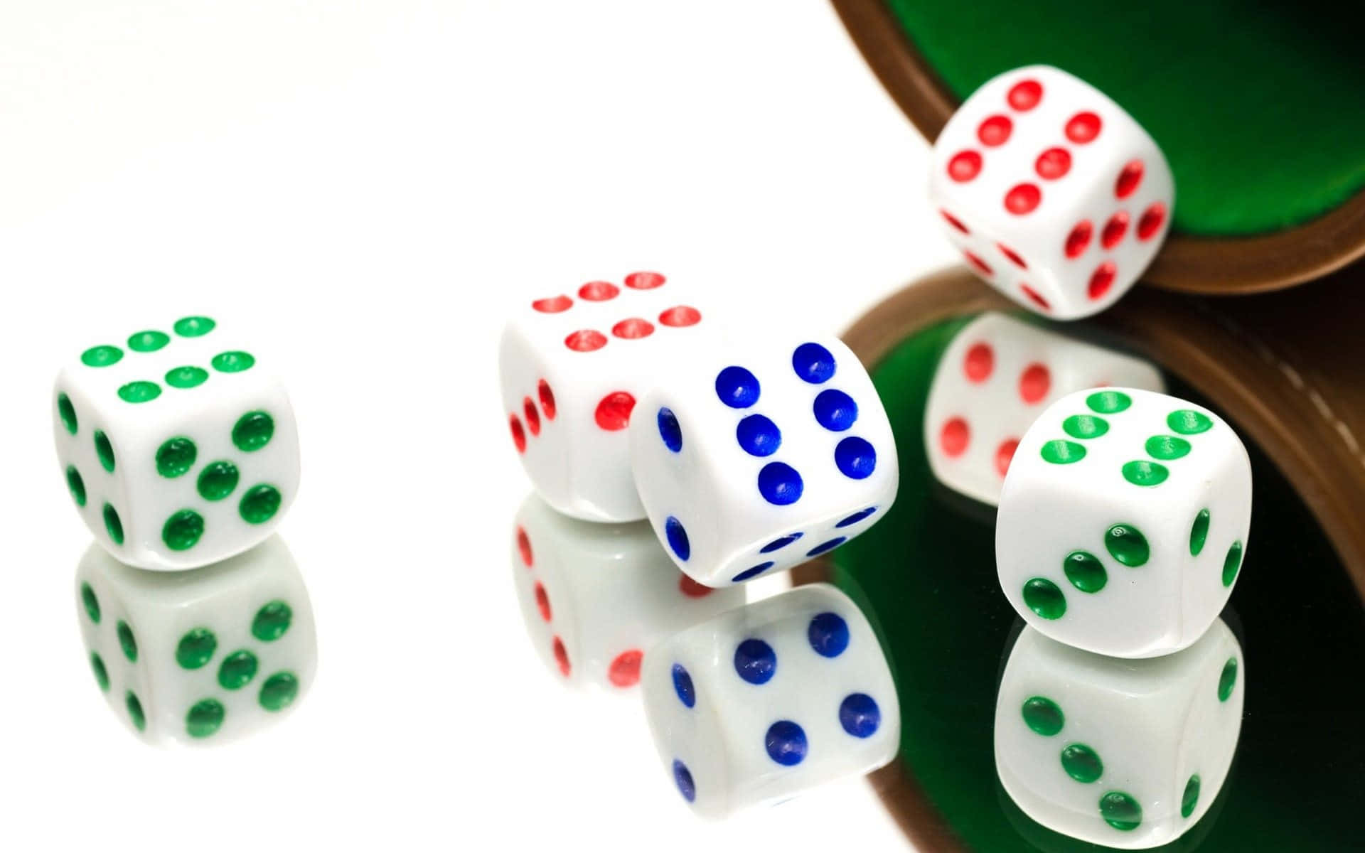 colorful dice, red green and blue dots, reflective green felt surface, Full HD Desktop Wallpaper