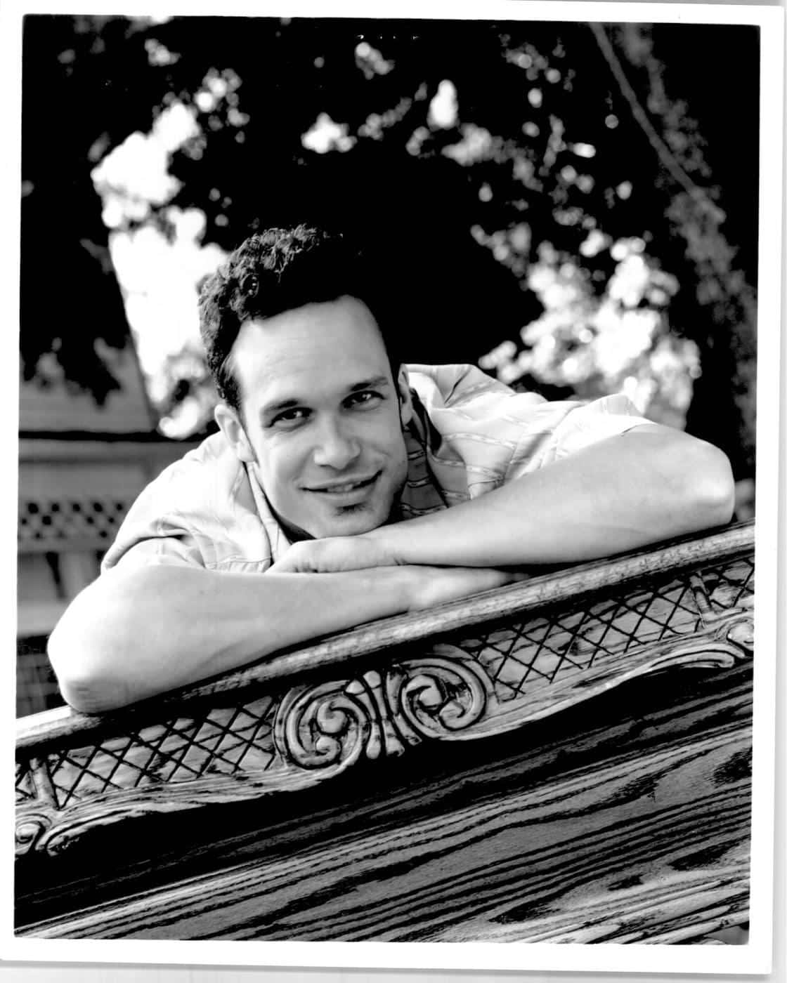 Diedrich Bader, ornate wooden railing, blurred foliage, HD Phone Wallpaper