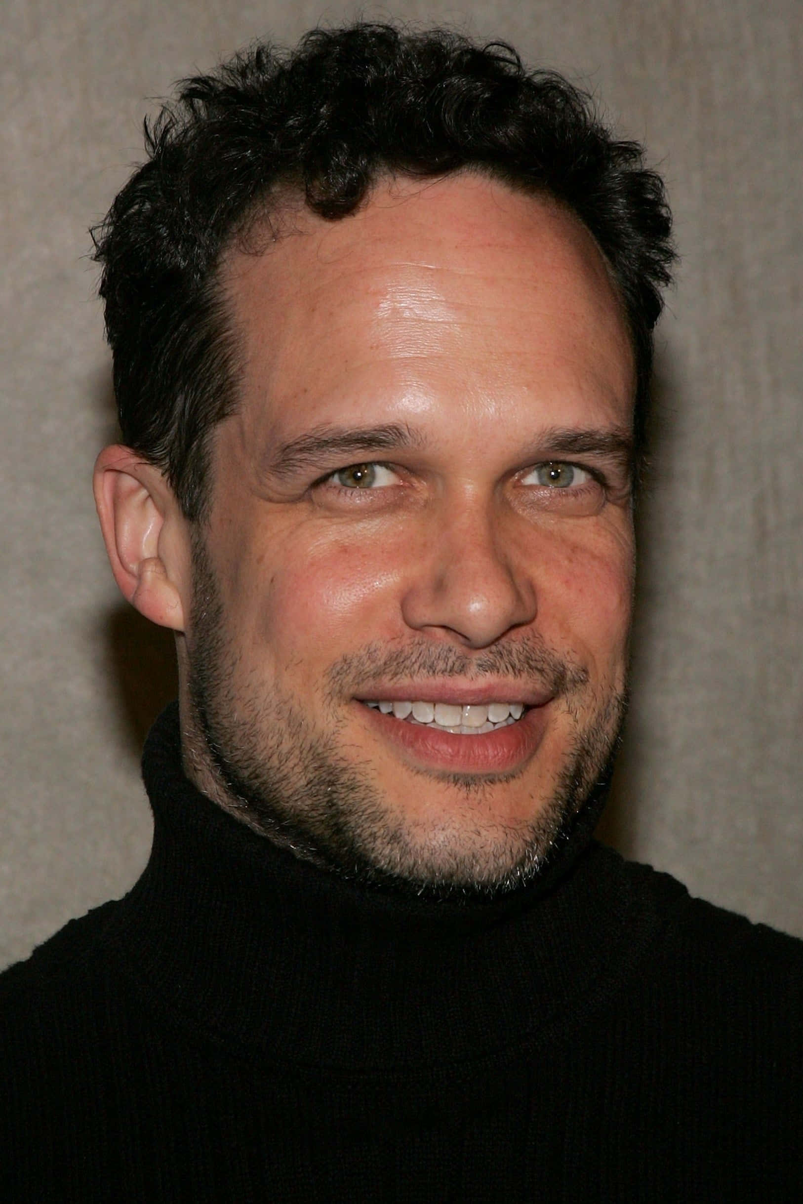 Diedrich Bader, black turtleneck, neutral textured wall, Full HD Phone Wallpaper