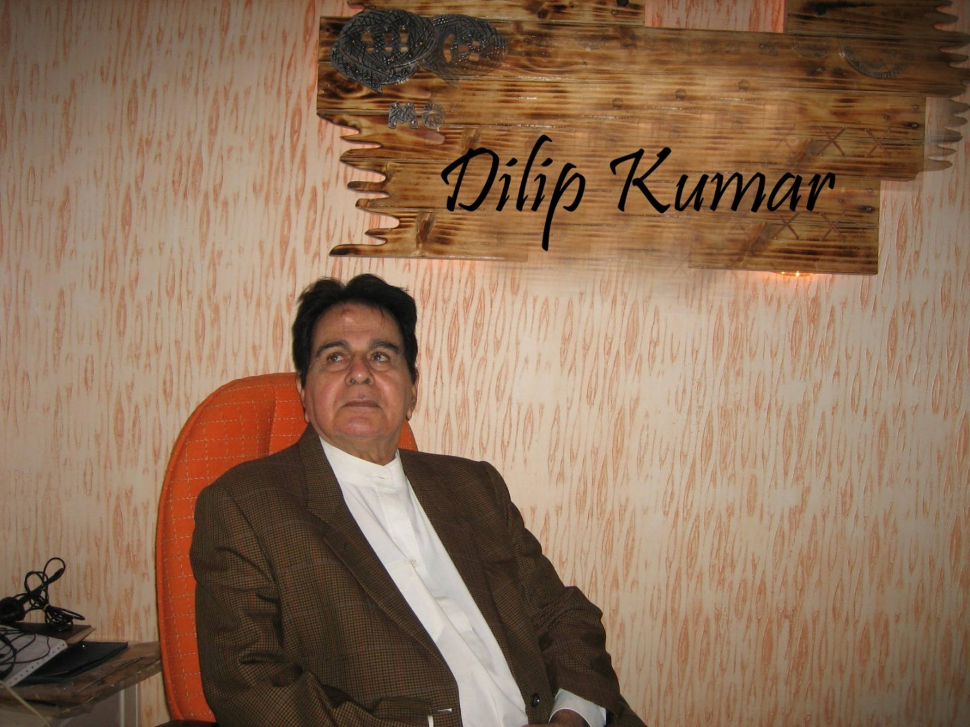 Dilip Kumar, orange chair, brown suit, Full HD Desktop Wallpaper