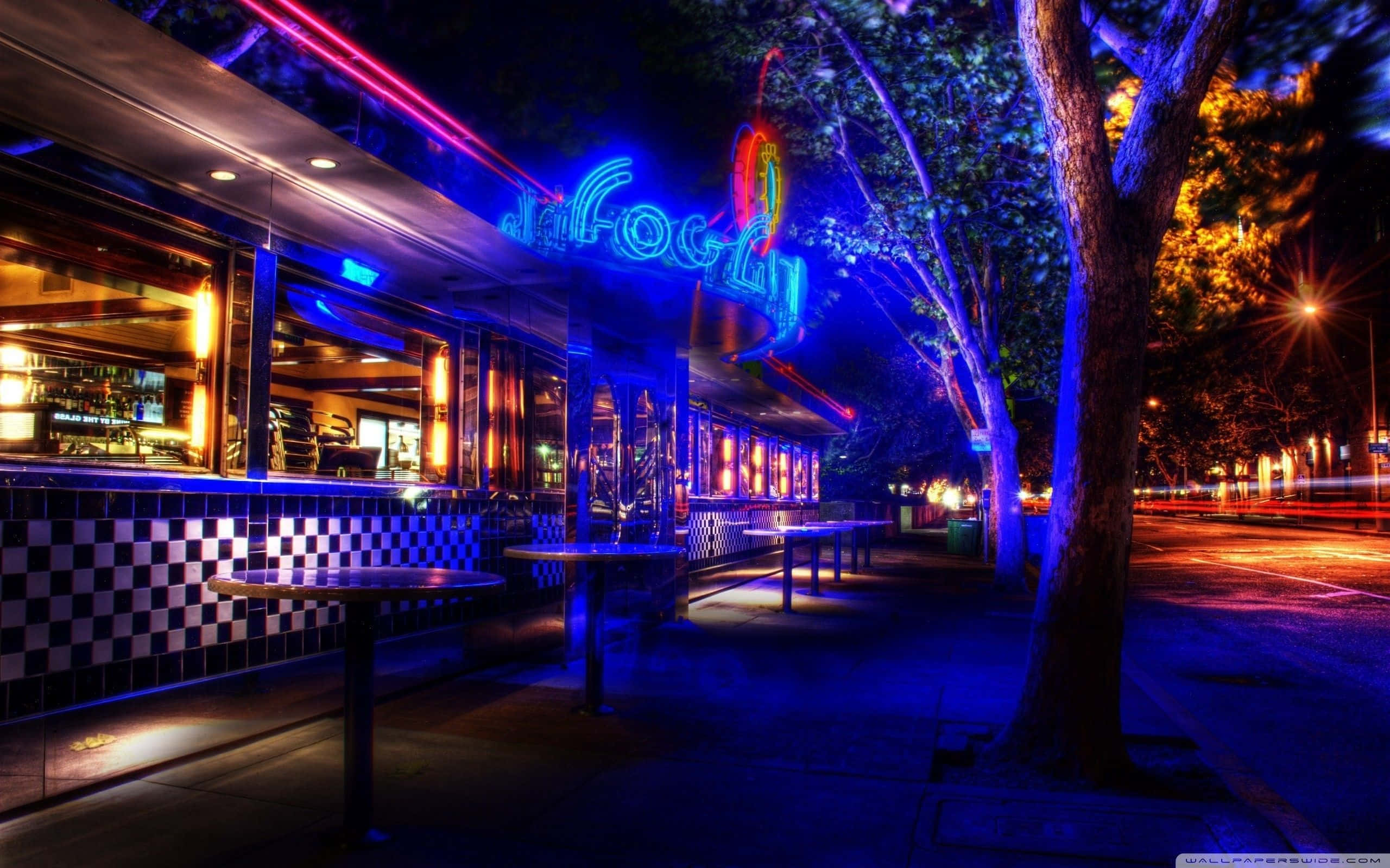 retro diner, neon-lit diner, blue and orange lights, 2K Desktop Wallpaper