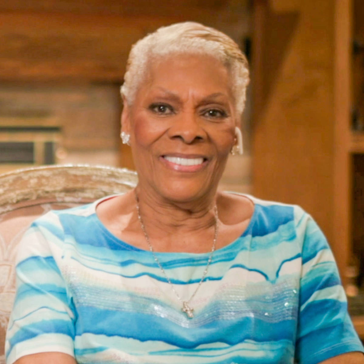 Dionne Warwick, blue and white striped top, wooden chair, SD Phone Wallpaper