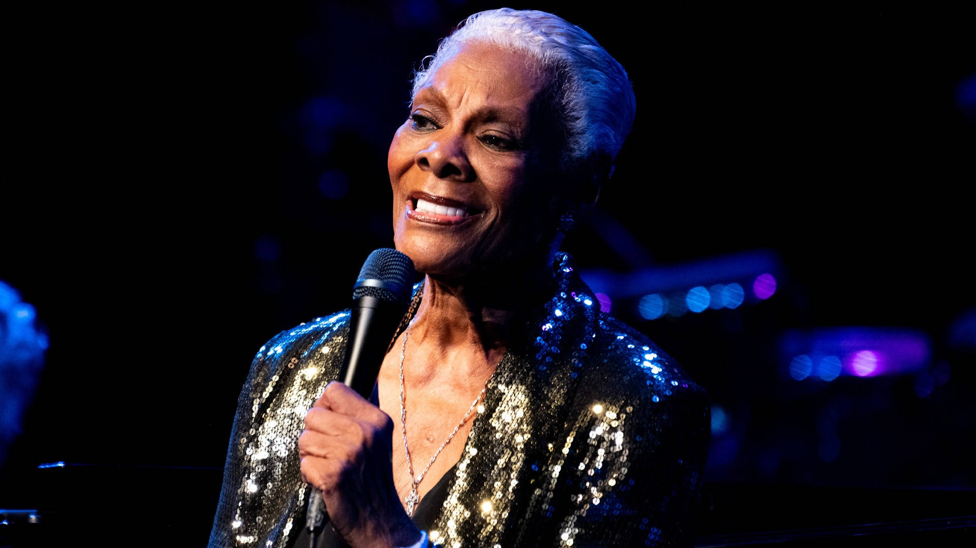 Dionne Warwick, glittering gold jacket, microphone, Full HD Desktop Wallpaper