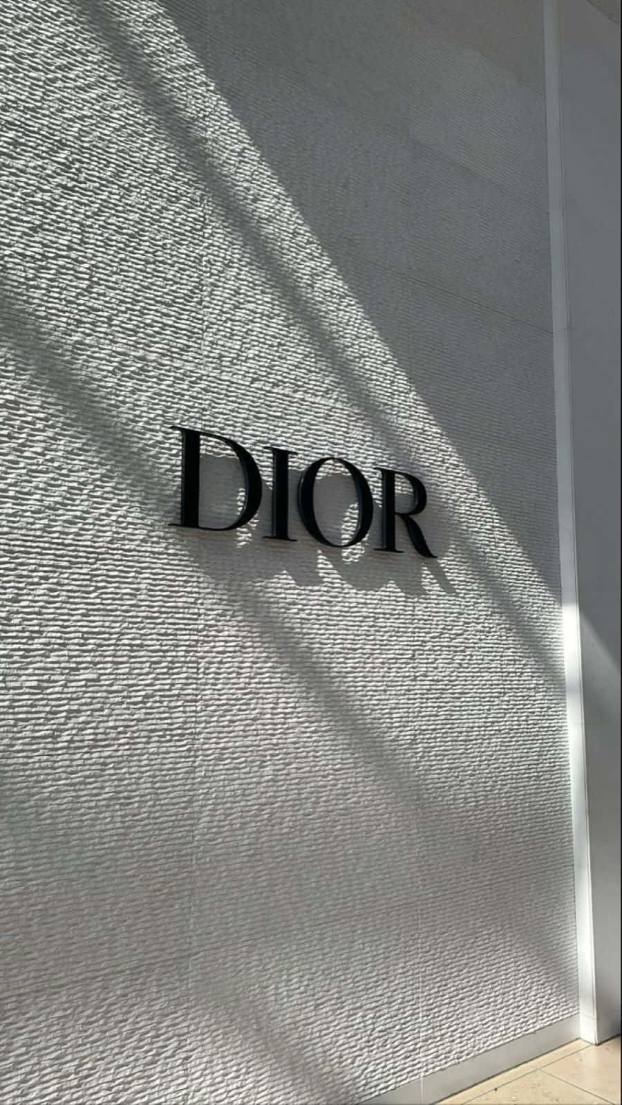 Dior, black Dior logo, textured white wall, HD Phone Wallpaper