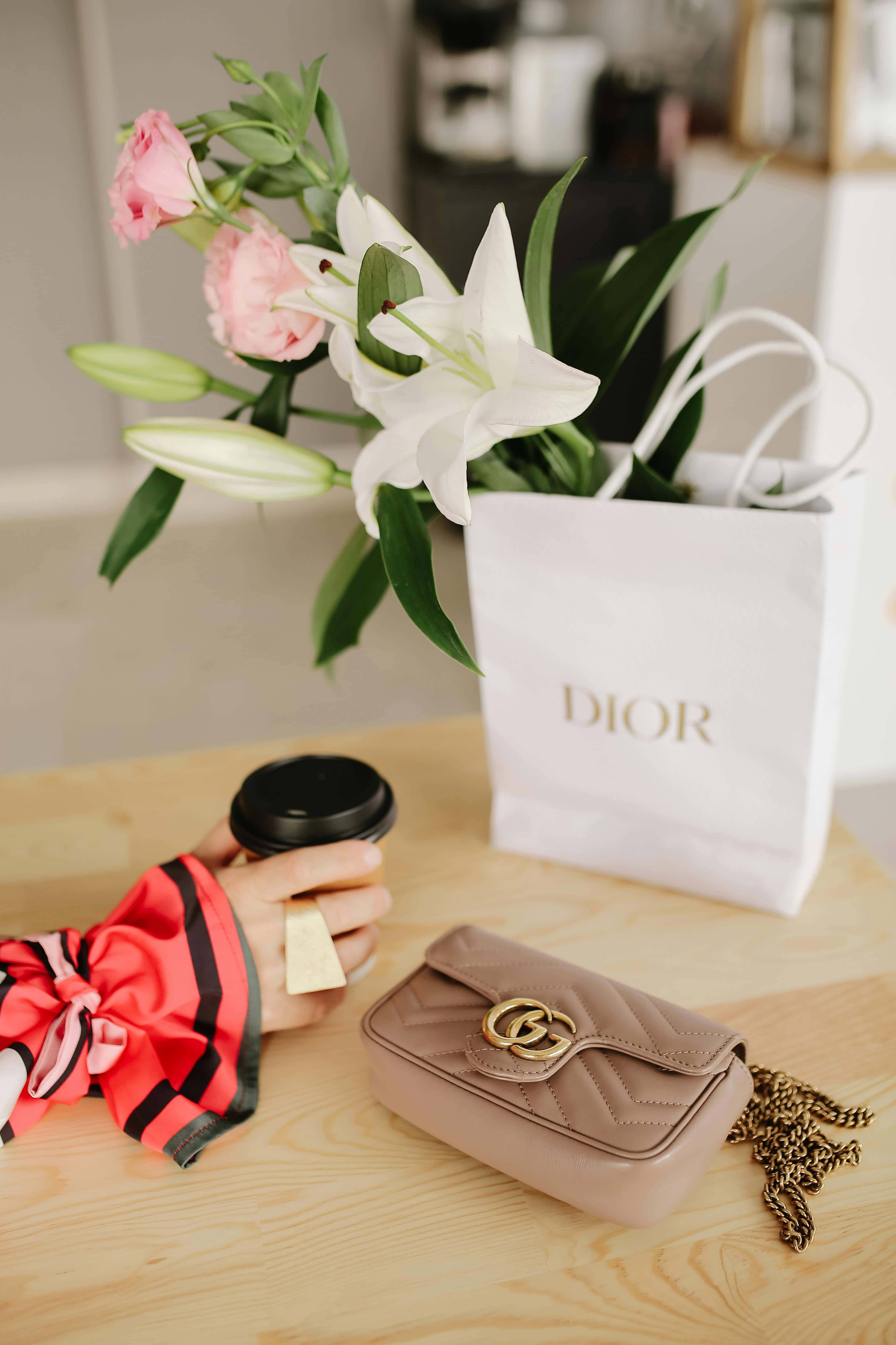 Dior, beige quilted purse, wooden table, 5K Phone Wallpaper