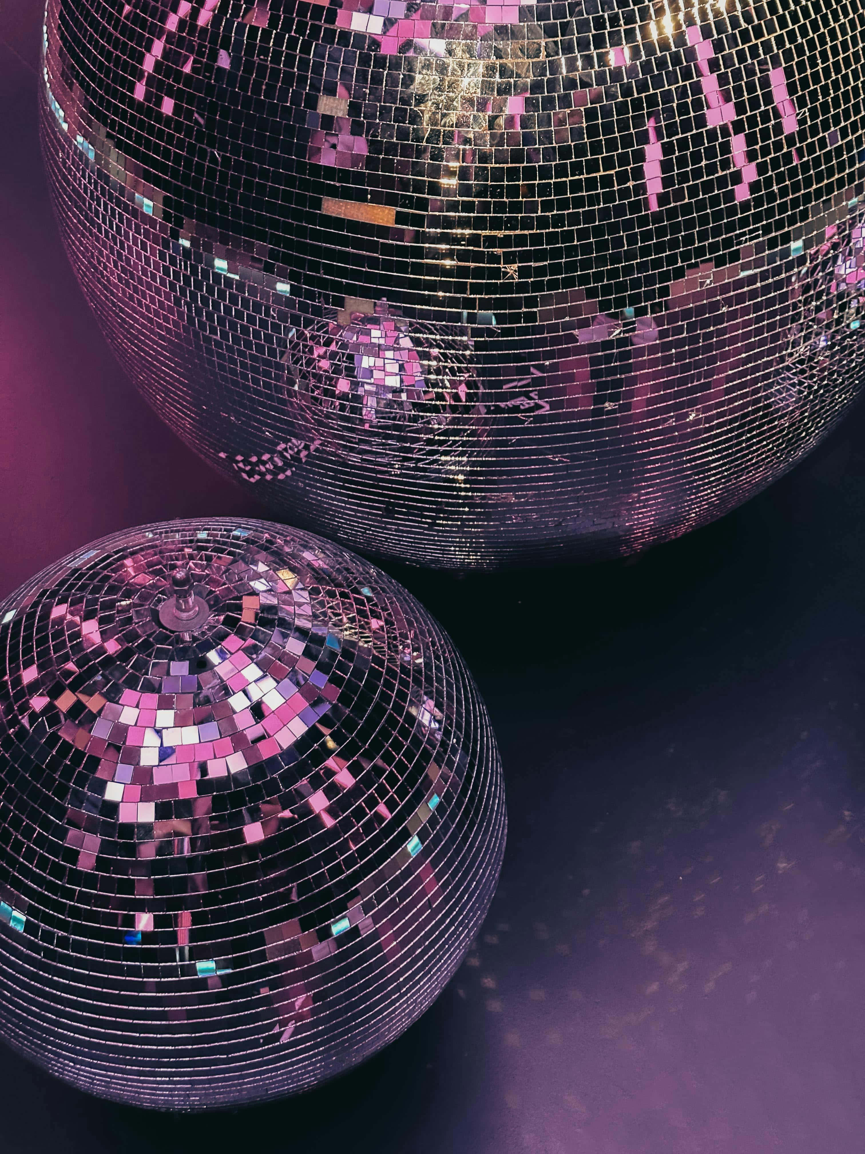 disco ball, pink and silver mirrored tiles, vibrant purple light, 4K Phone Wallpaper