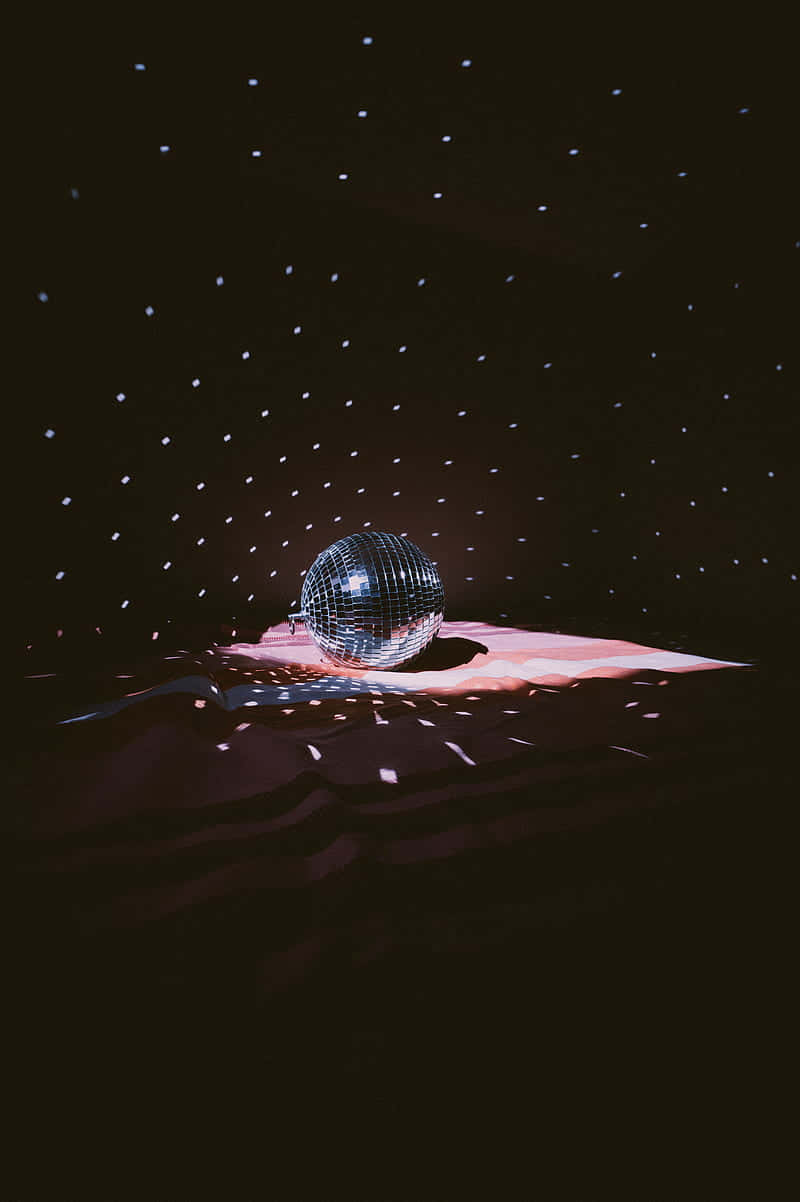 disco ball, pink fabric surface, starlike reflections, SD Phone Wallpaper