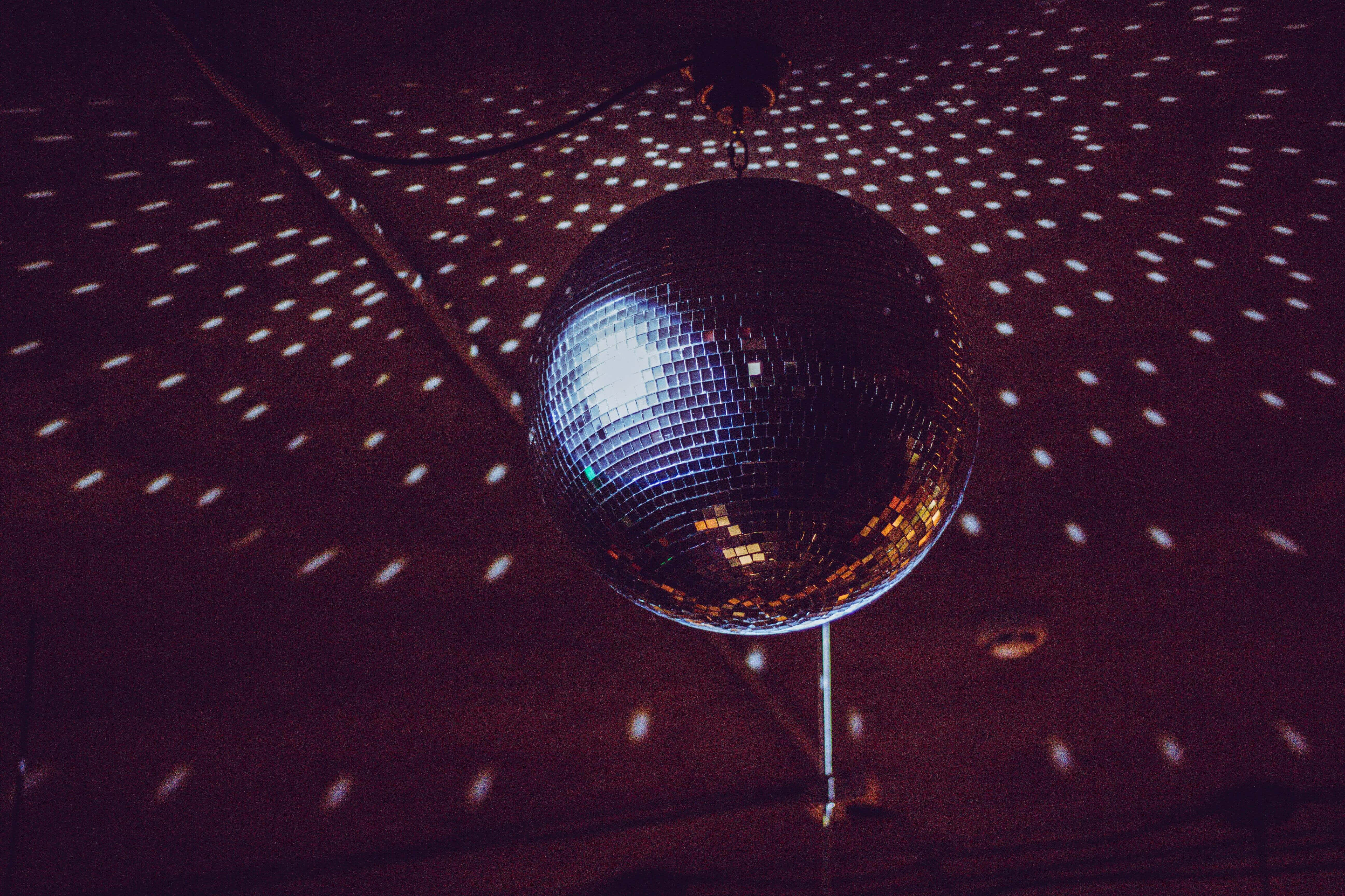 disco ball, bright white dots of light, dark purple room, 5K Desktop Wallpaper