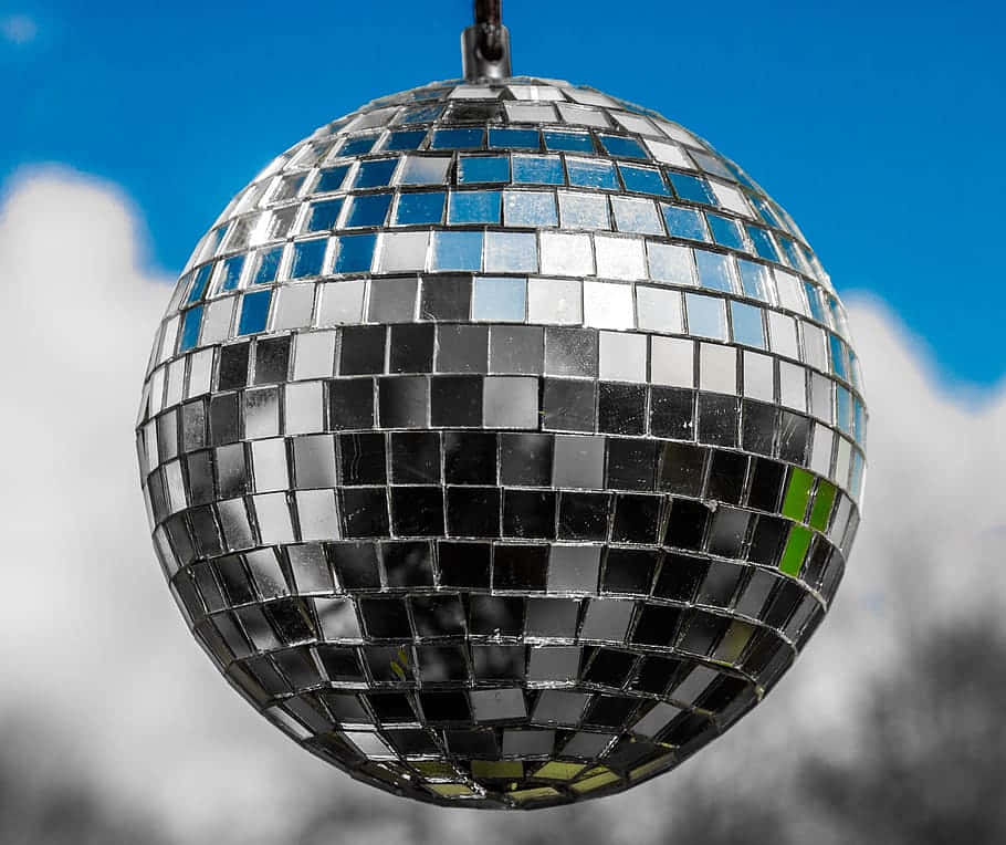 hanging disco ball, bright blue sky, fluffy white clouds, SD Desktop Wallpaper