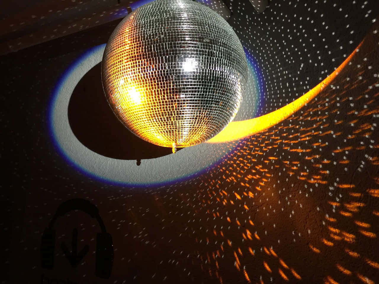 disco ball, vibrant orange and blue light patterns, dark wall, HD Desktop Wallpaper