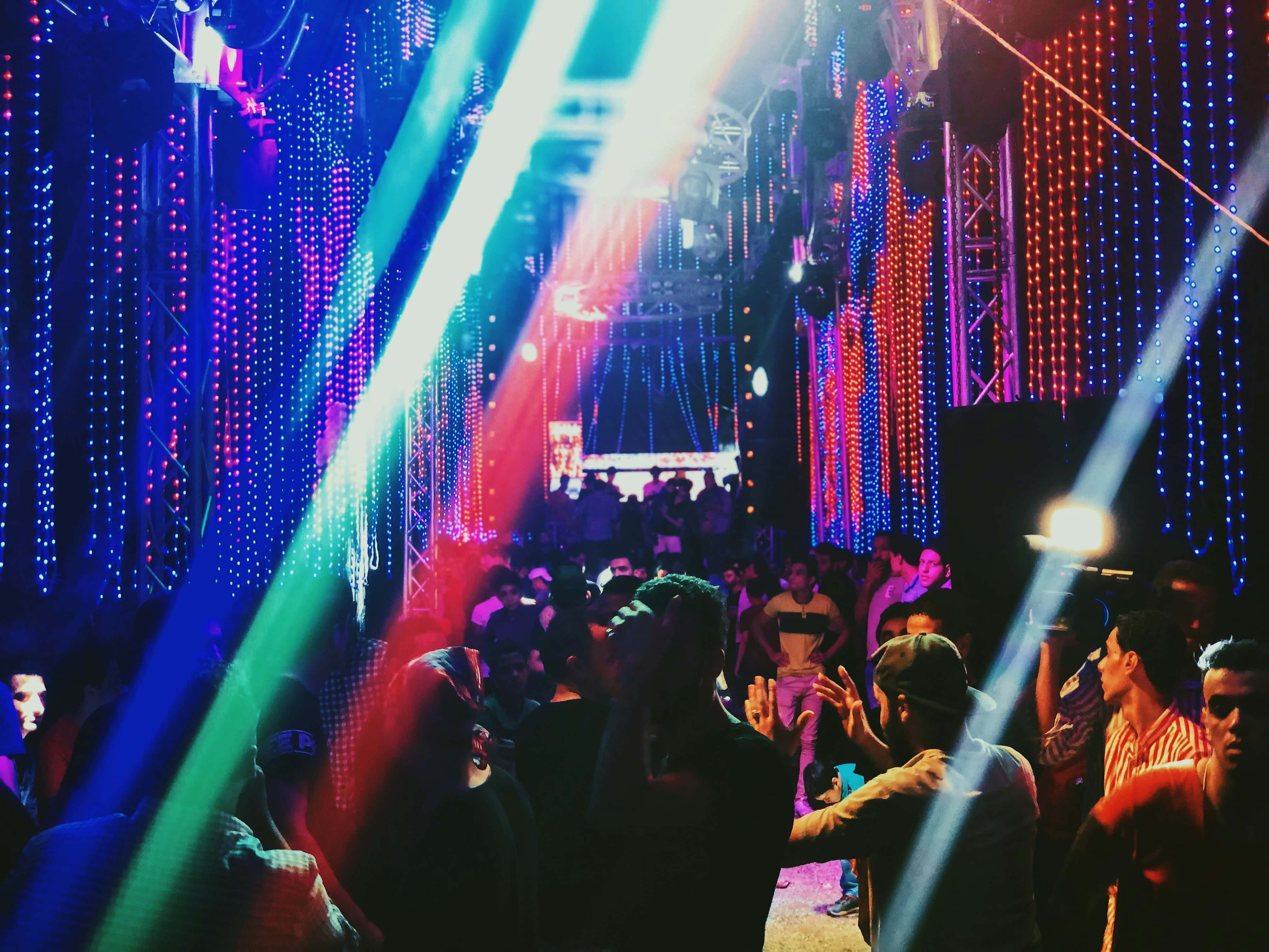 vibrant laser beams, cascading LED lights, pulsating nightclub, 4K Desktop Wallpaper