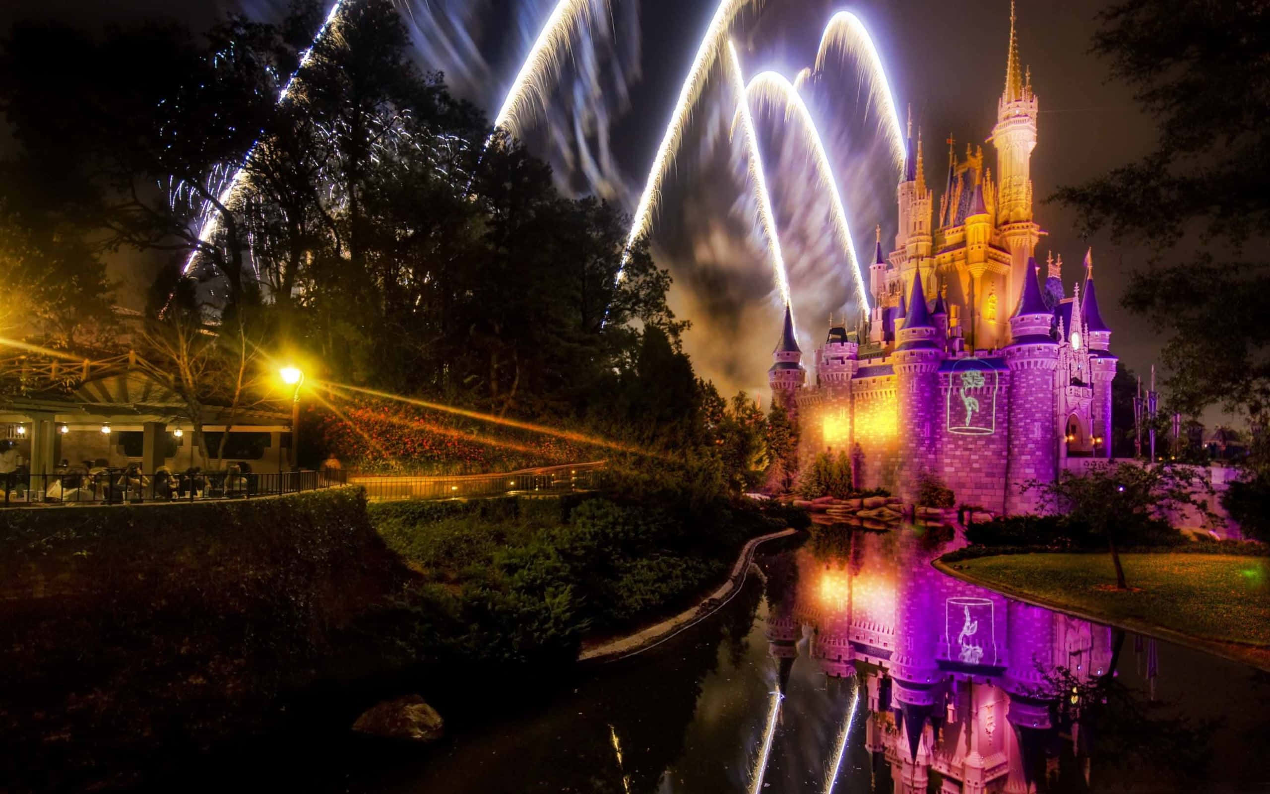 Disney Mac, castle, purple and gold lights, 2K Desktop Wallpaper