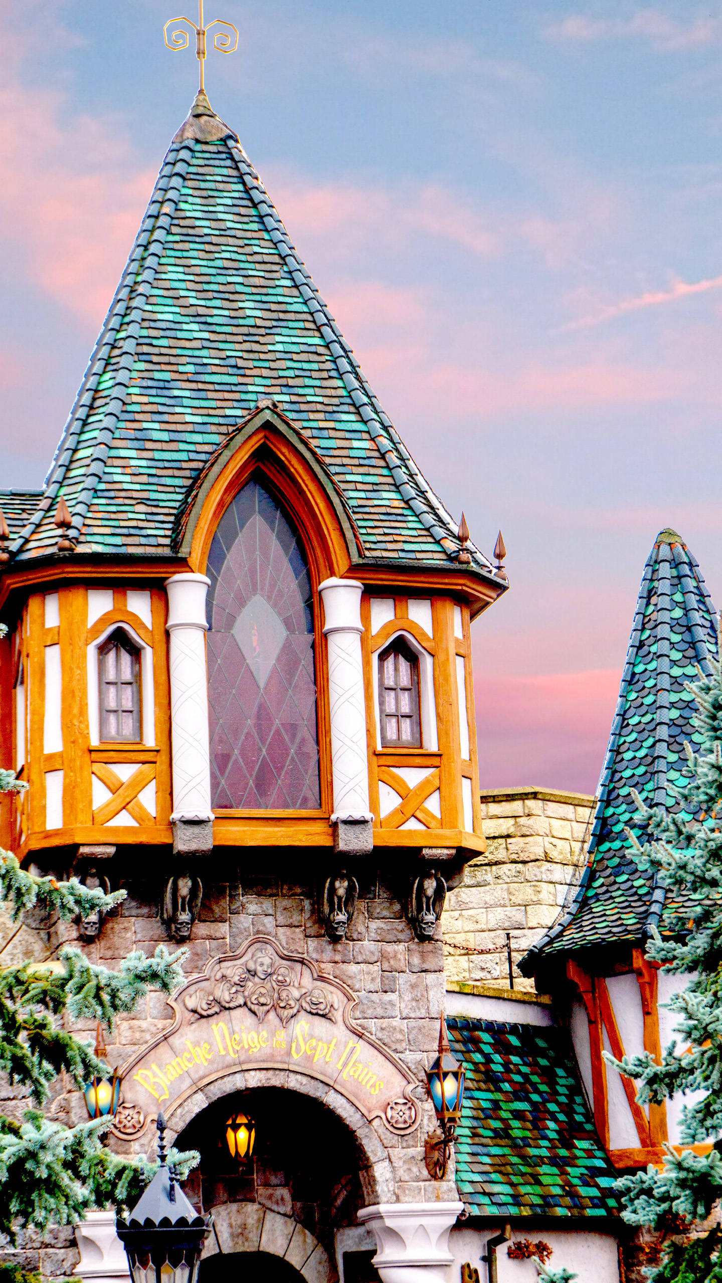 Disneyland Castle, pink sky, green glass roof, 2K Phone Wallpaper