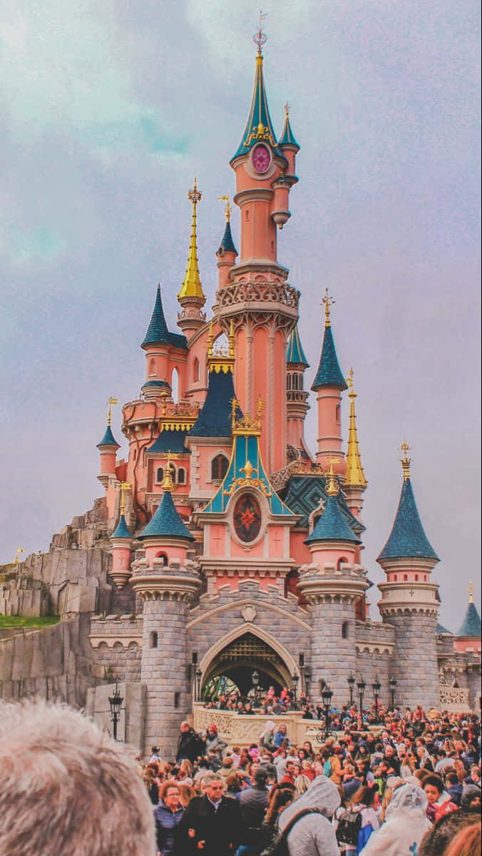 Disneyland Paris, pink and blue castle, golden spires, SD Phone Wallpaper