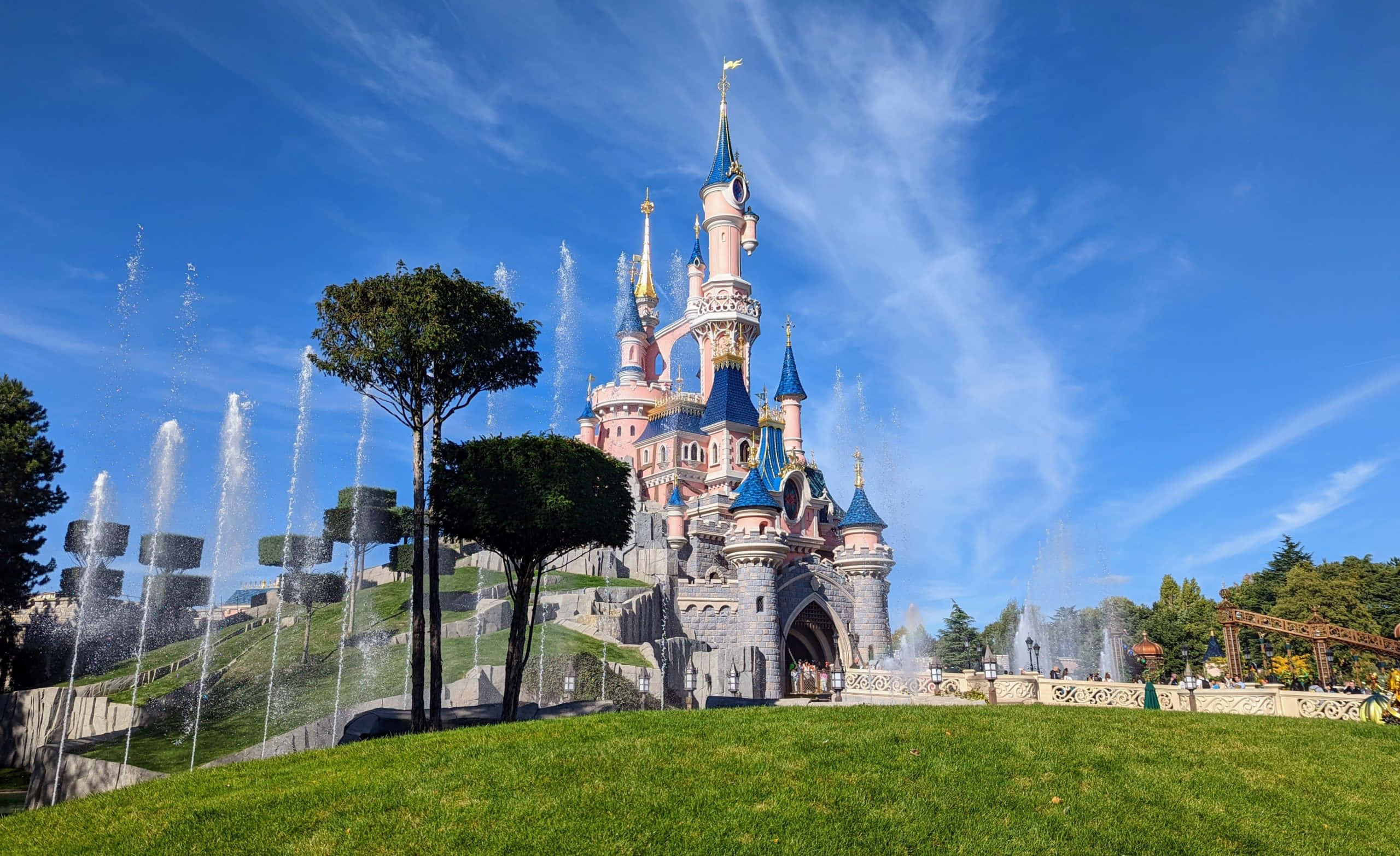 Disneyland Paris, pink and blue castle, spires, 2K Desktop Wallpaper