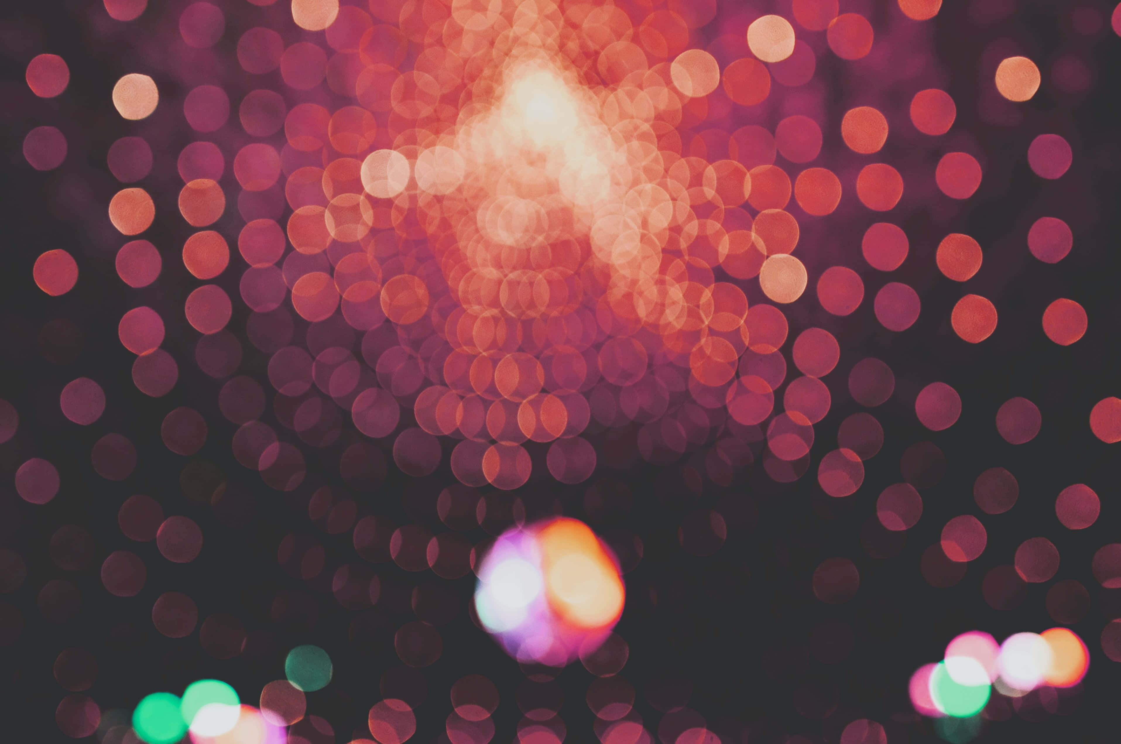 bokeh, glowing red orange and green lights, dark background, 2K Desktop Wallpaper