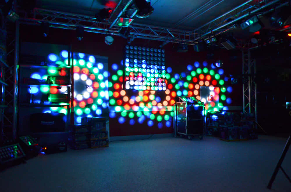 nightclub stage, vibrant circular disco lights, colorful bokeh patterns, SD Desktop Wallpaper