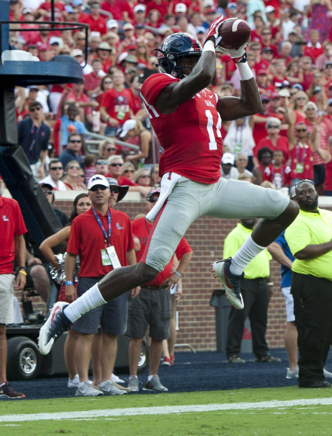 DK Metcalf, red jersey, football player, HD Phone Wallpaper