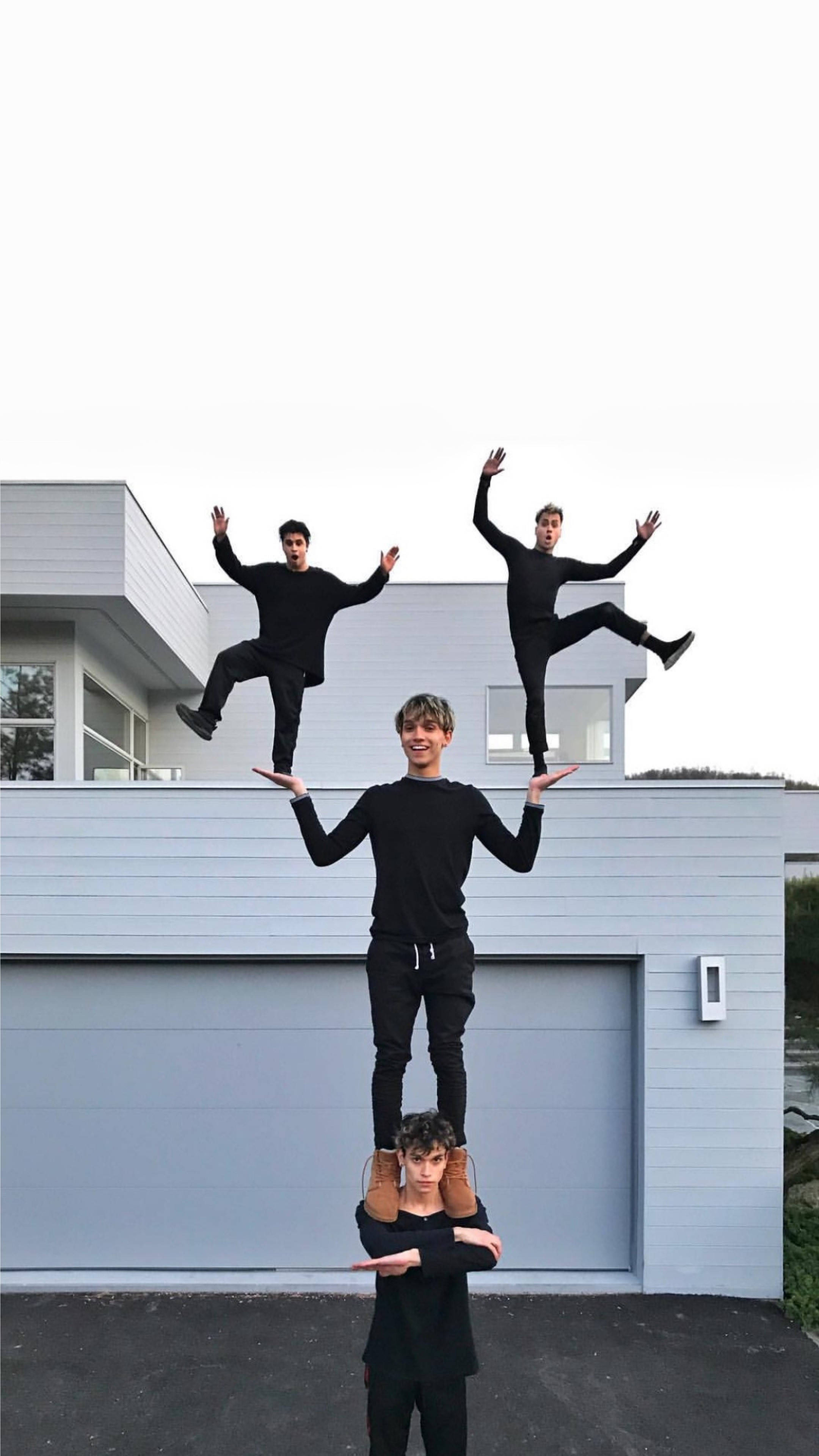 Dobre Brothers, human pyramid, black outfits, 4K Phone Wallpaper