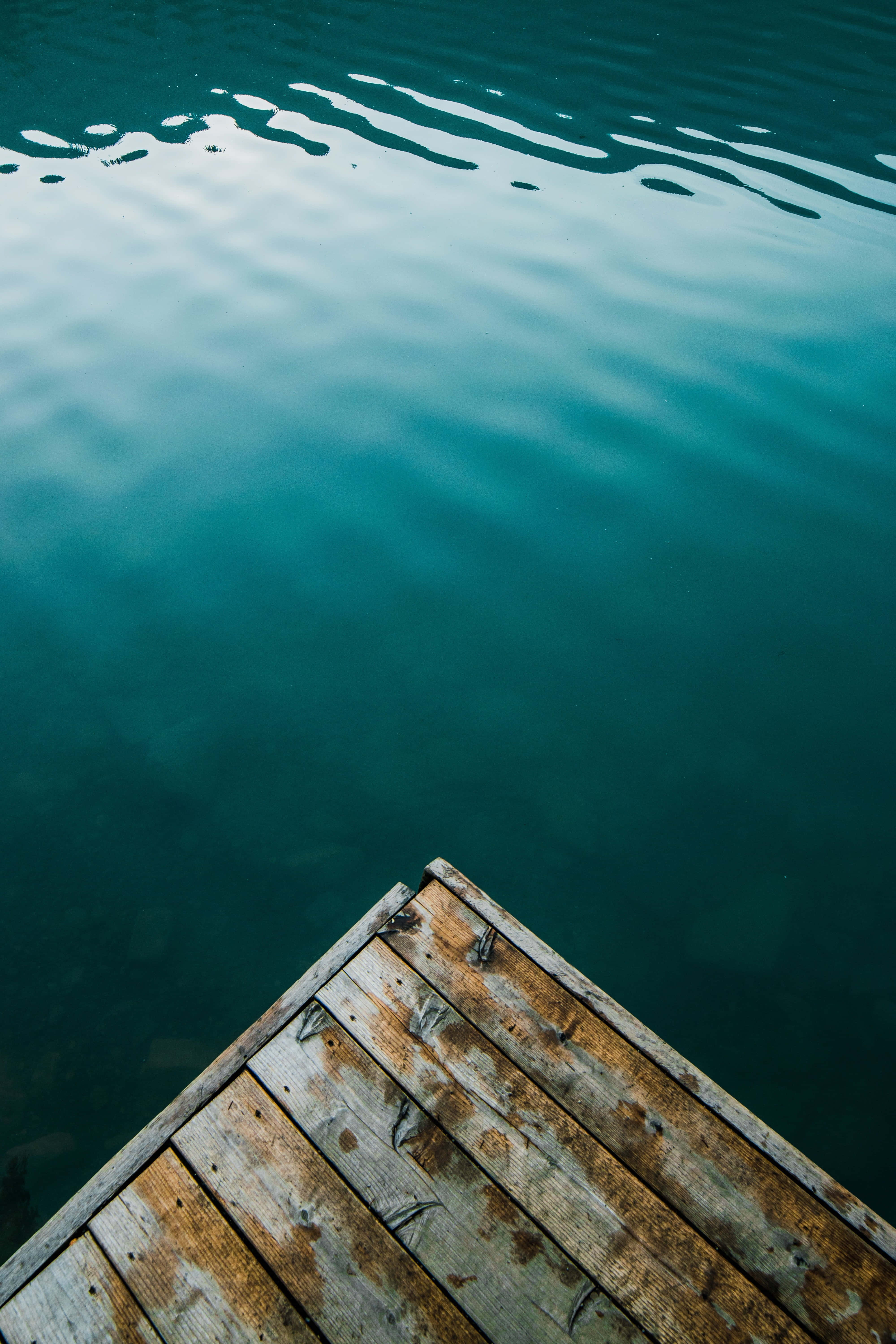 Still Waters Phone, wooden dock, calm turquoise water, 5K Phone Wallpaper