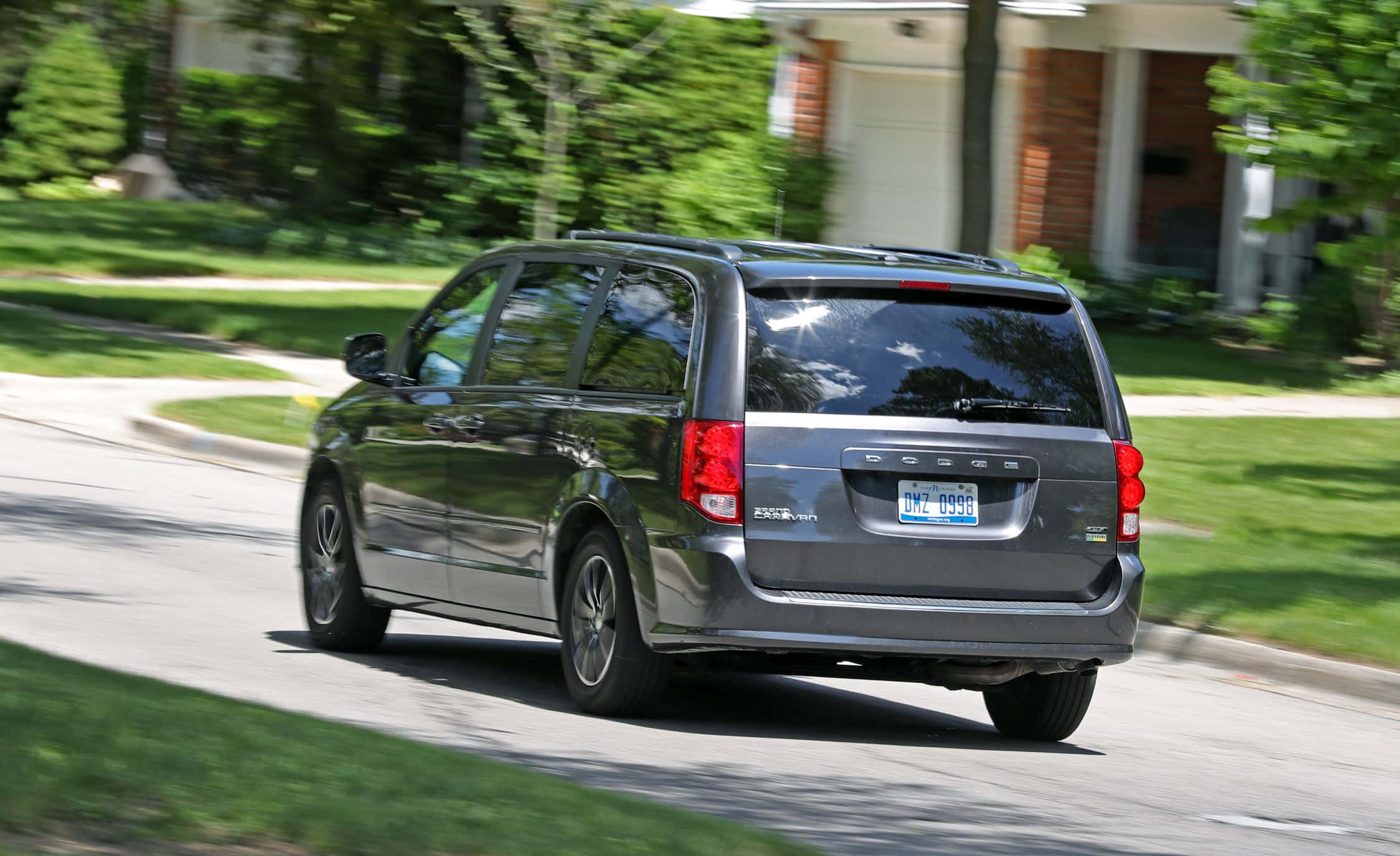 Dodge Grand Caravan, dark gray, tree-lined suburban street, Full HD Desktop Wallpaper